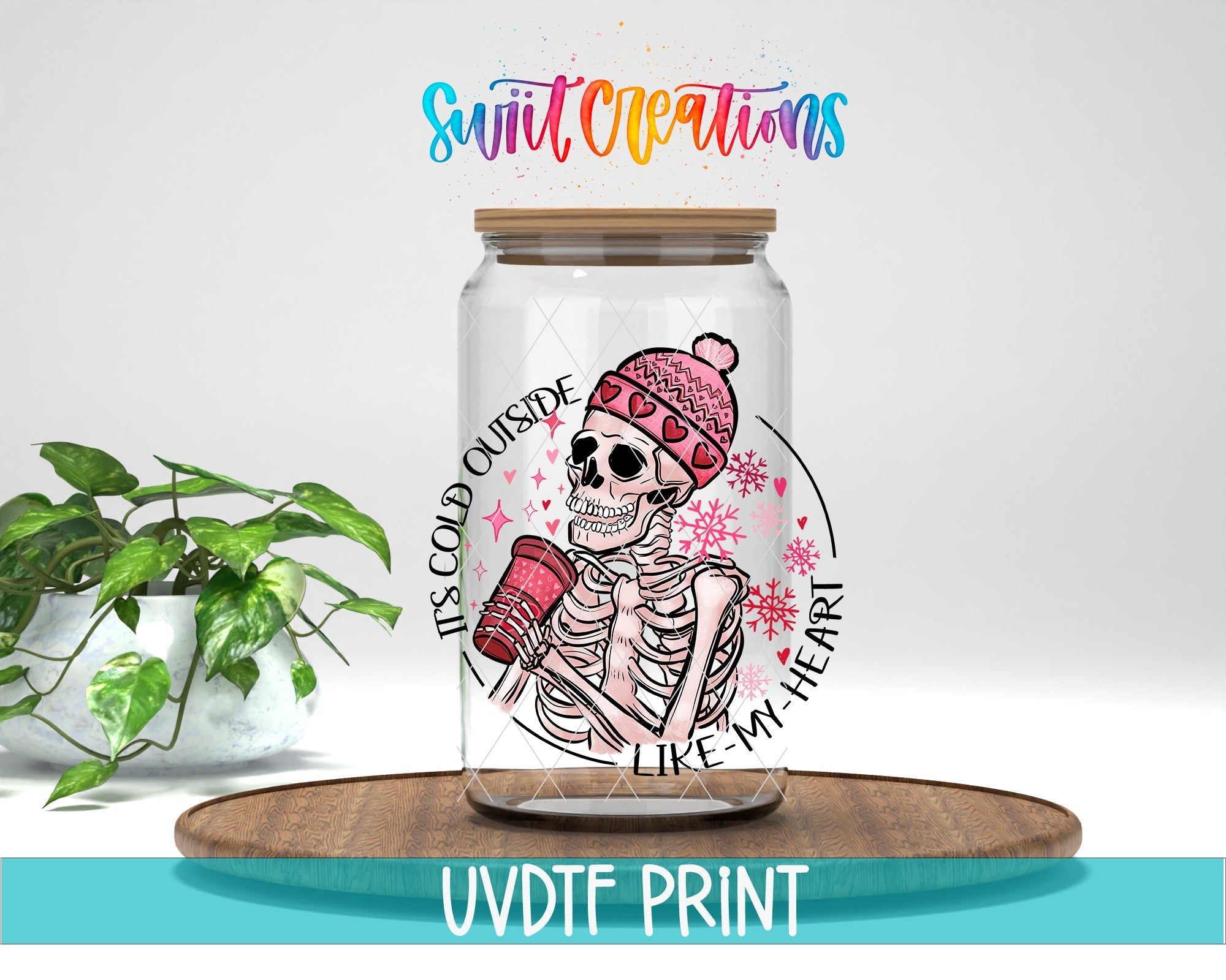 a glass jar with a skeleton inside of it