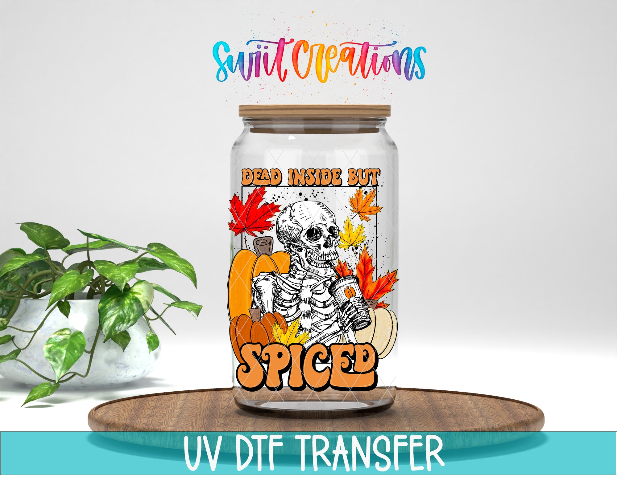 a glass jar with a label that includes a skeleton, pumpkins, and leaves, along with the text "Dead inside but Spiced" and "UV DFT Transfer".