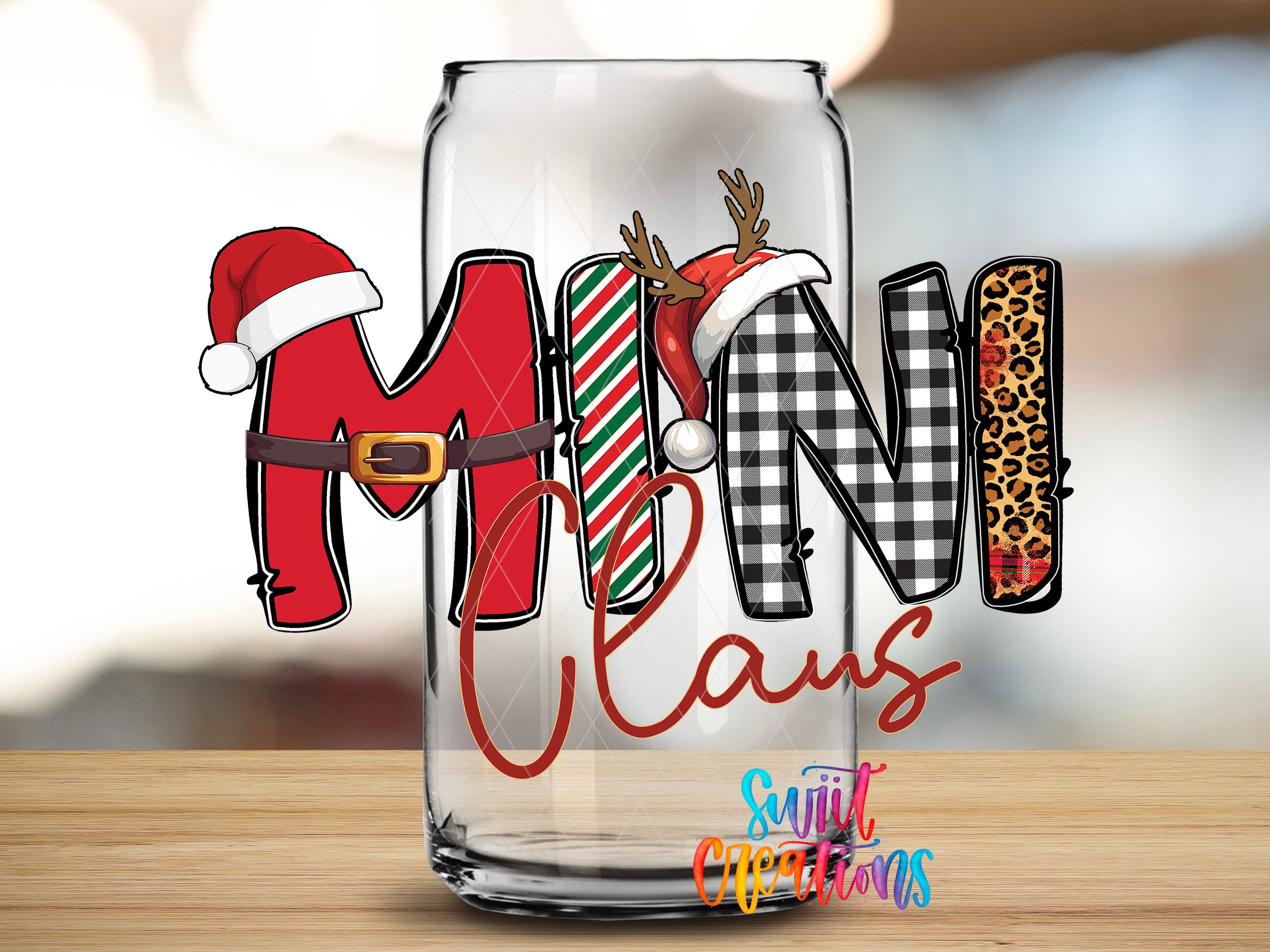 A glass can with the word "MINI CLaws" written on it, along with a Santa hat and antlers.