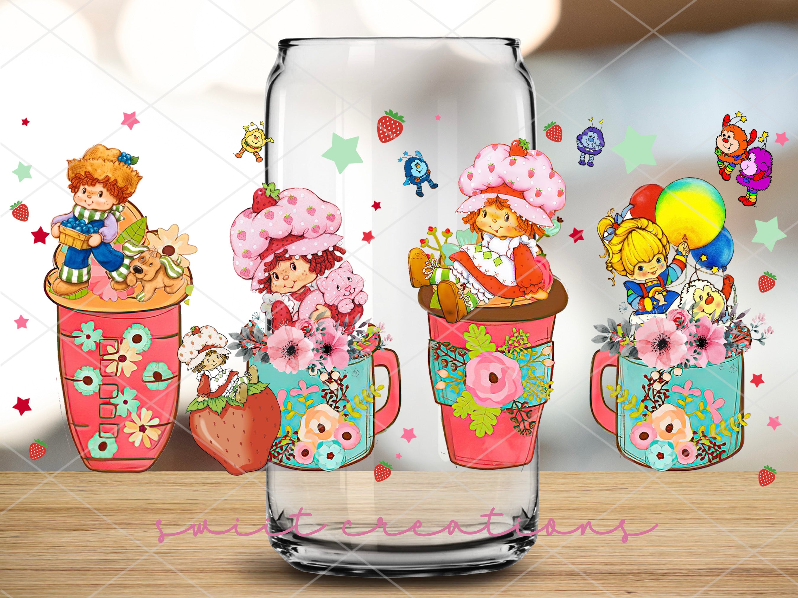 a picture of a glass with a picture of a couple of cupcakes in