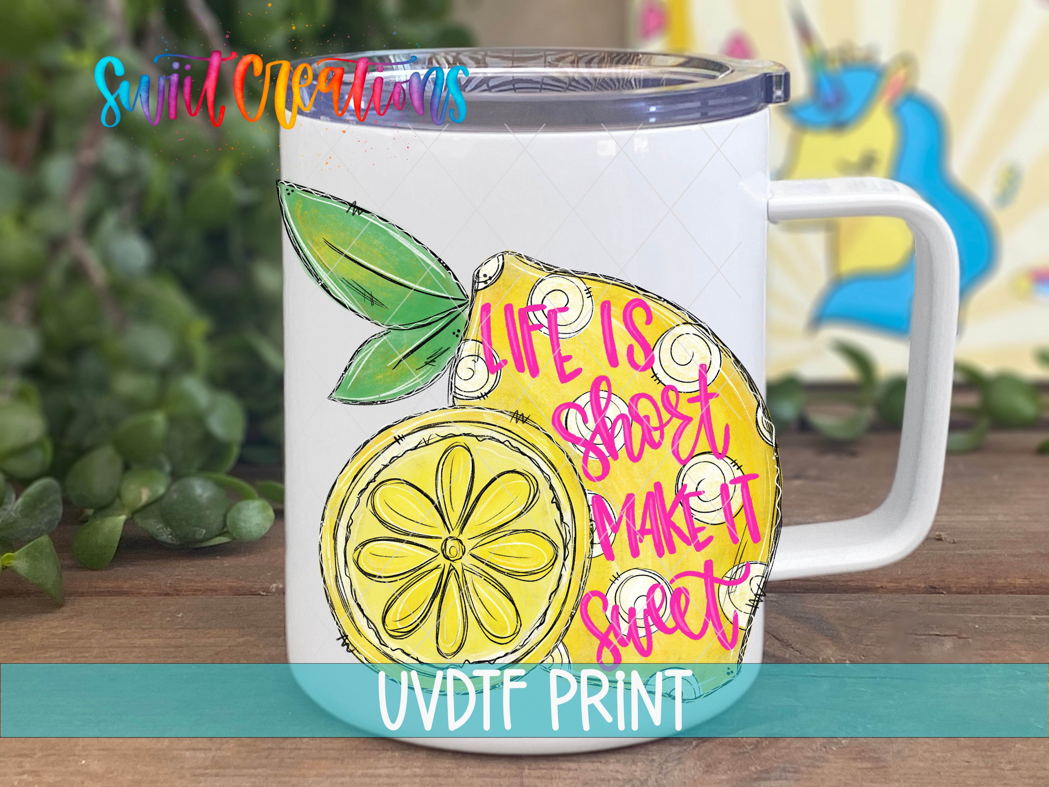 a white coffee mug with a lemon on it