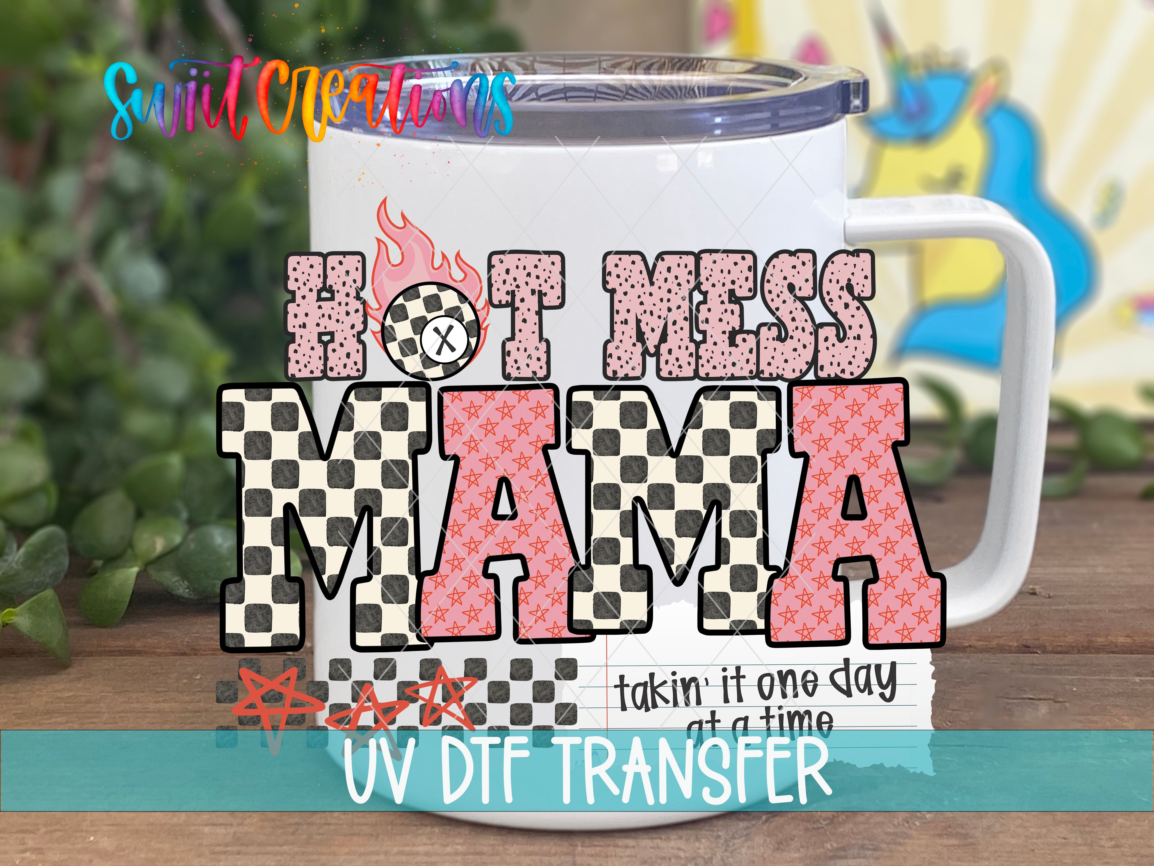 A white mug with a colorful design and text that says "HOT MESS MAMA" and "takin' it one day at a time".
