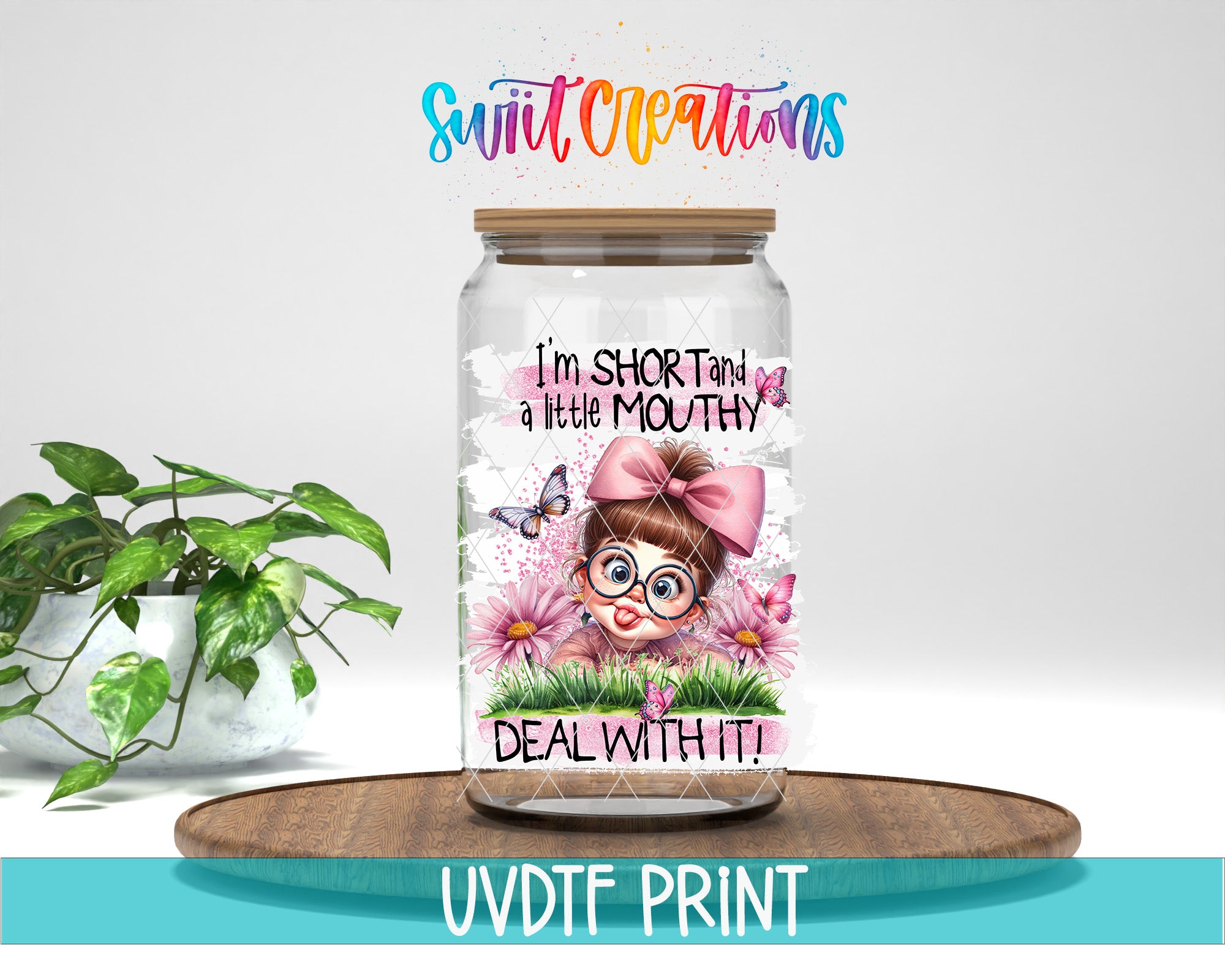 A glass jar with a label featuring a cartoon girl and flowers, placed on a wooden surface next to a potted plant.