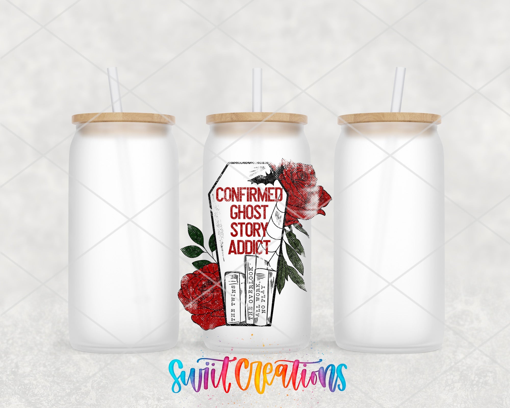 a couple of white jars with red roses on them