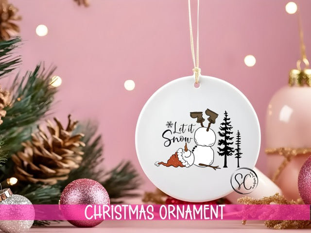 a christmas ornament hanging from a christmas tree