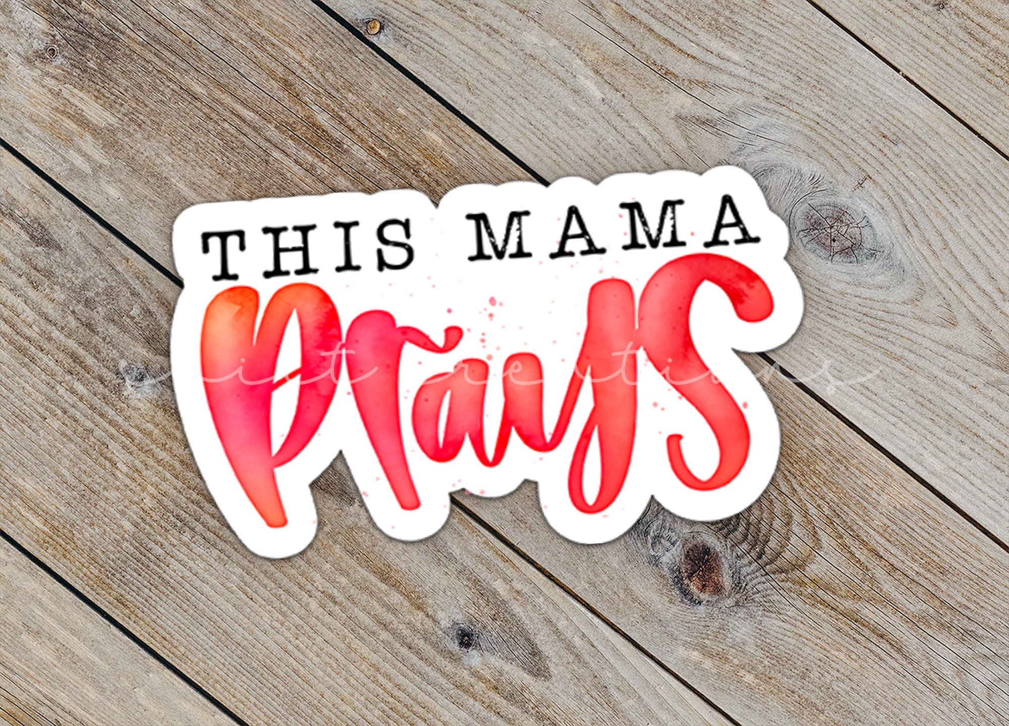 a sticker that says, this mama prays