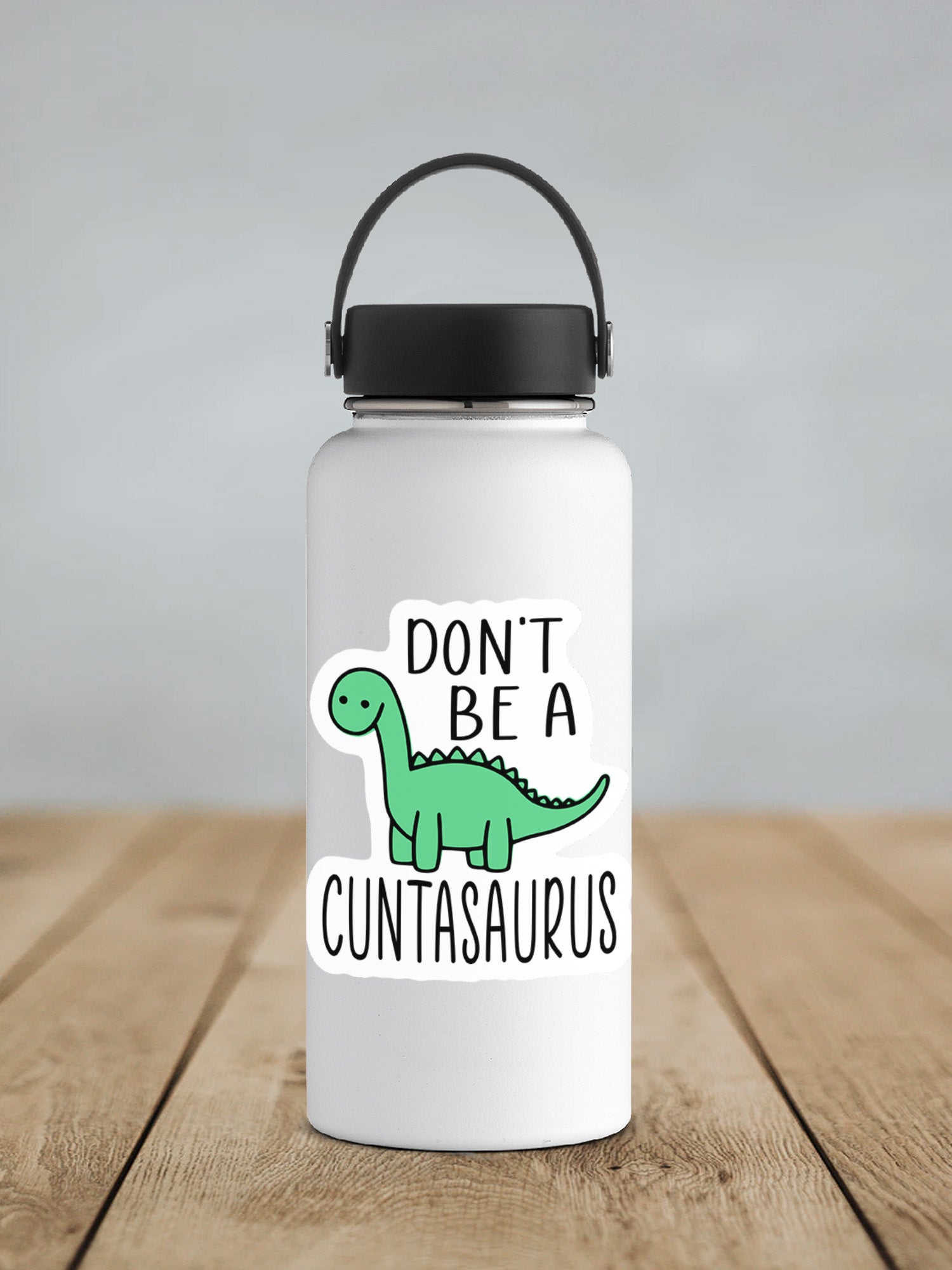 a white water bottle with a black lid that says, don't be a