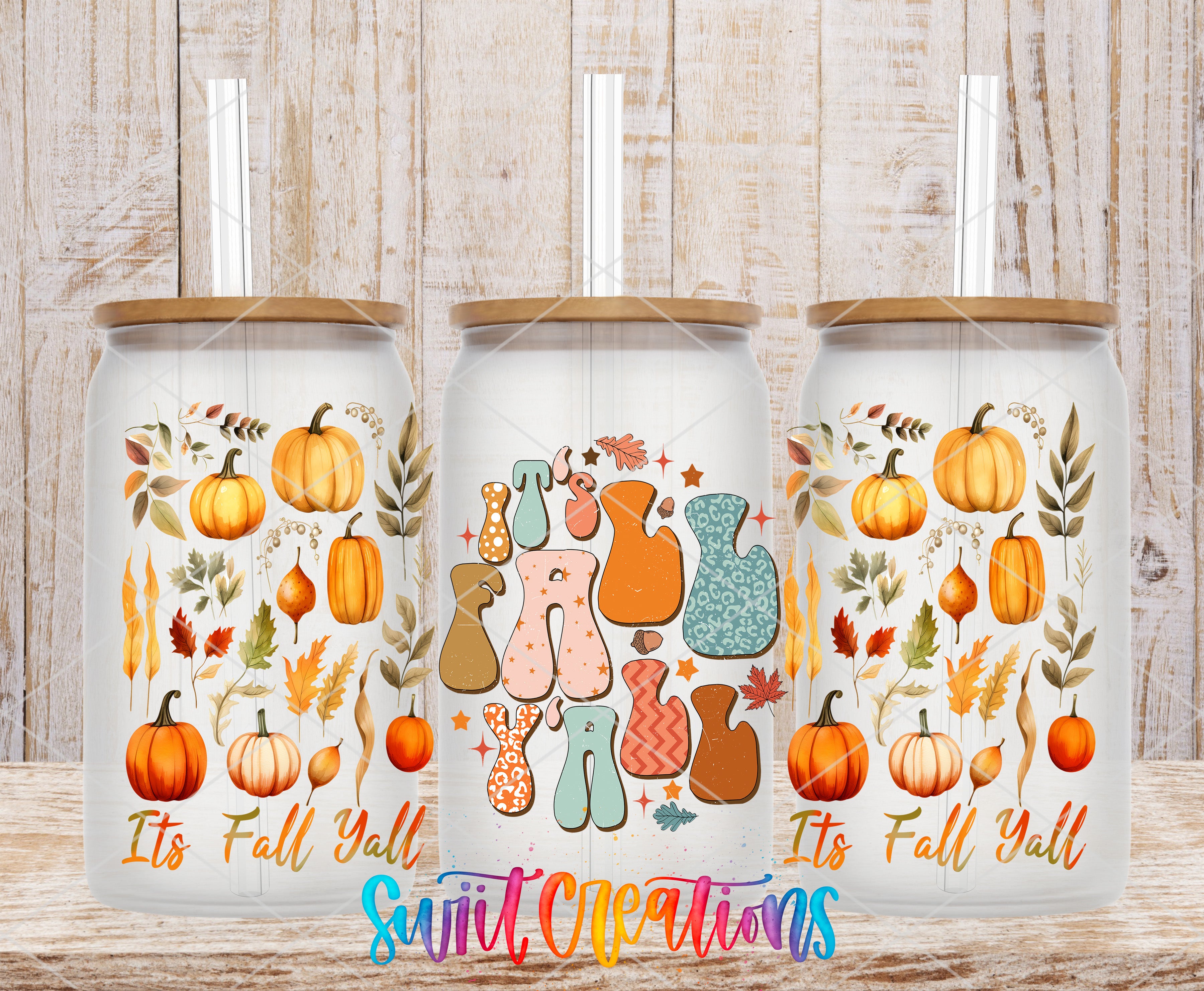 three glass tumblers with autumn-themed designs, including pumpkins, leaves, and other fall-related elements. The text on the tumblers reads "It's Fall Yalty" and "It's Fall Yalty", indicating a seasonal theme.