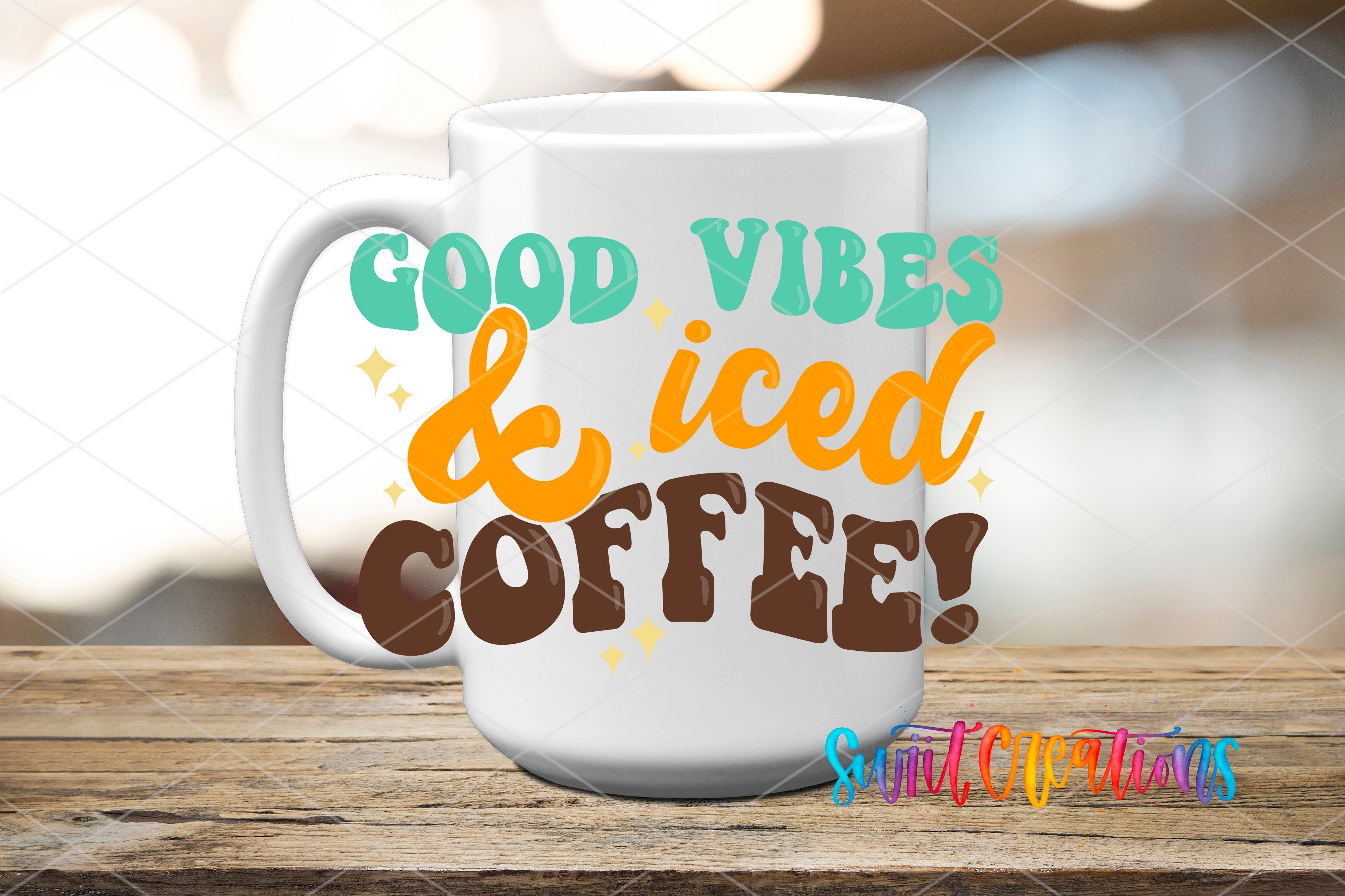 A white coffee mug with the text "GOOD VIBES & Iced COFFEE!" printed on it, along with some colorful graphics.