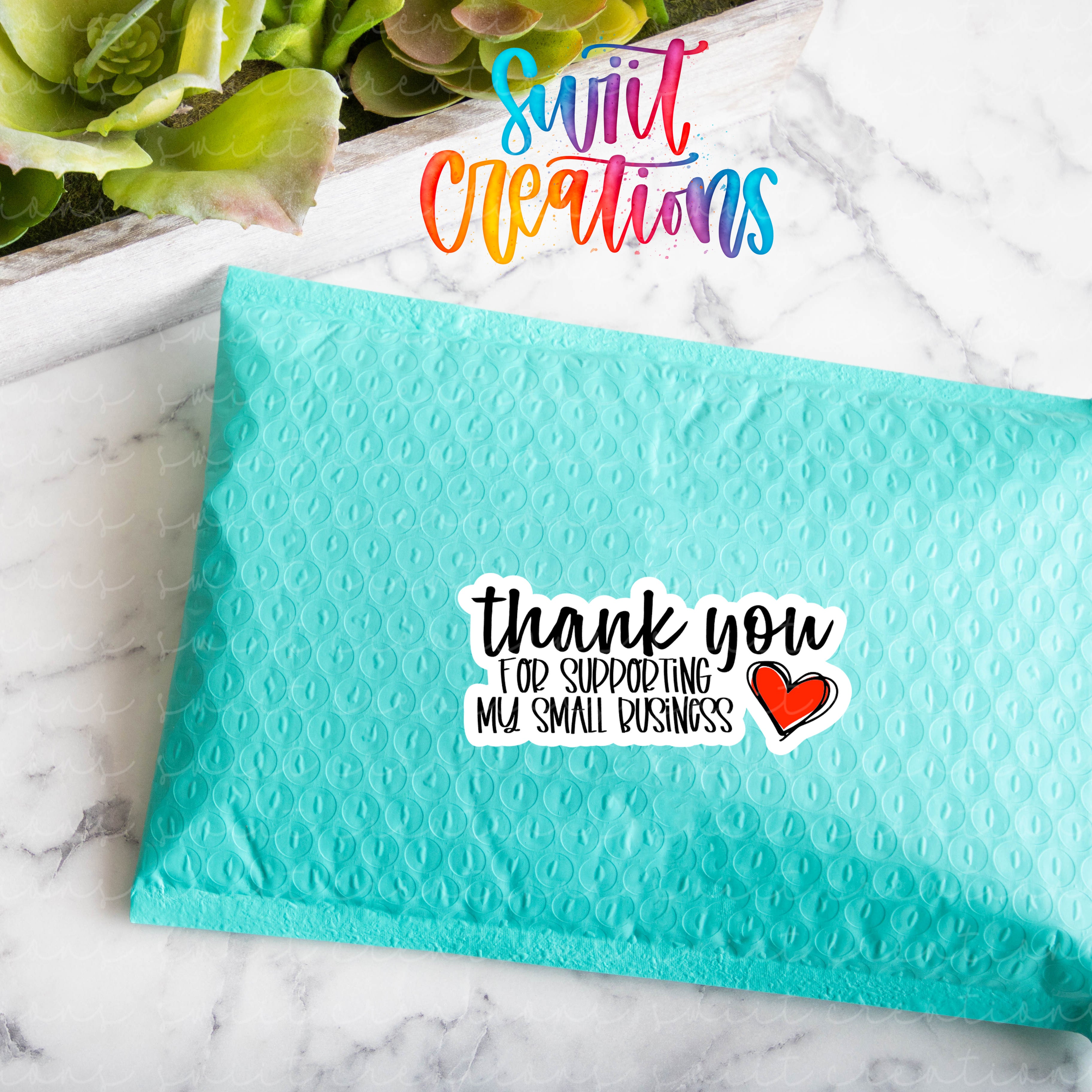 a blue envelope with a thank you message on it