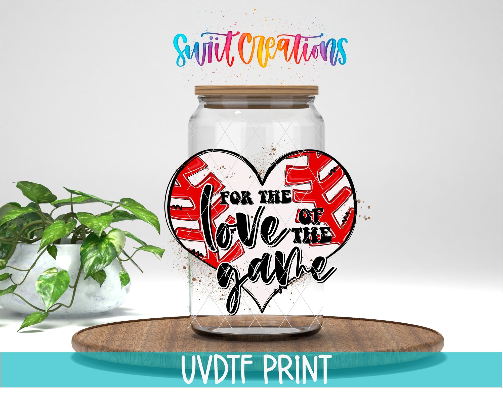 a glass jar with a painted heart on it