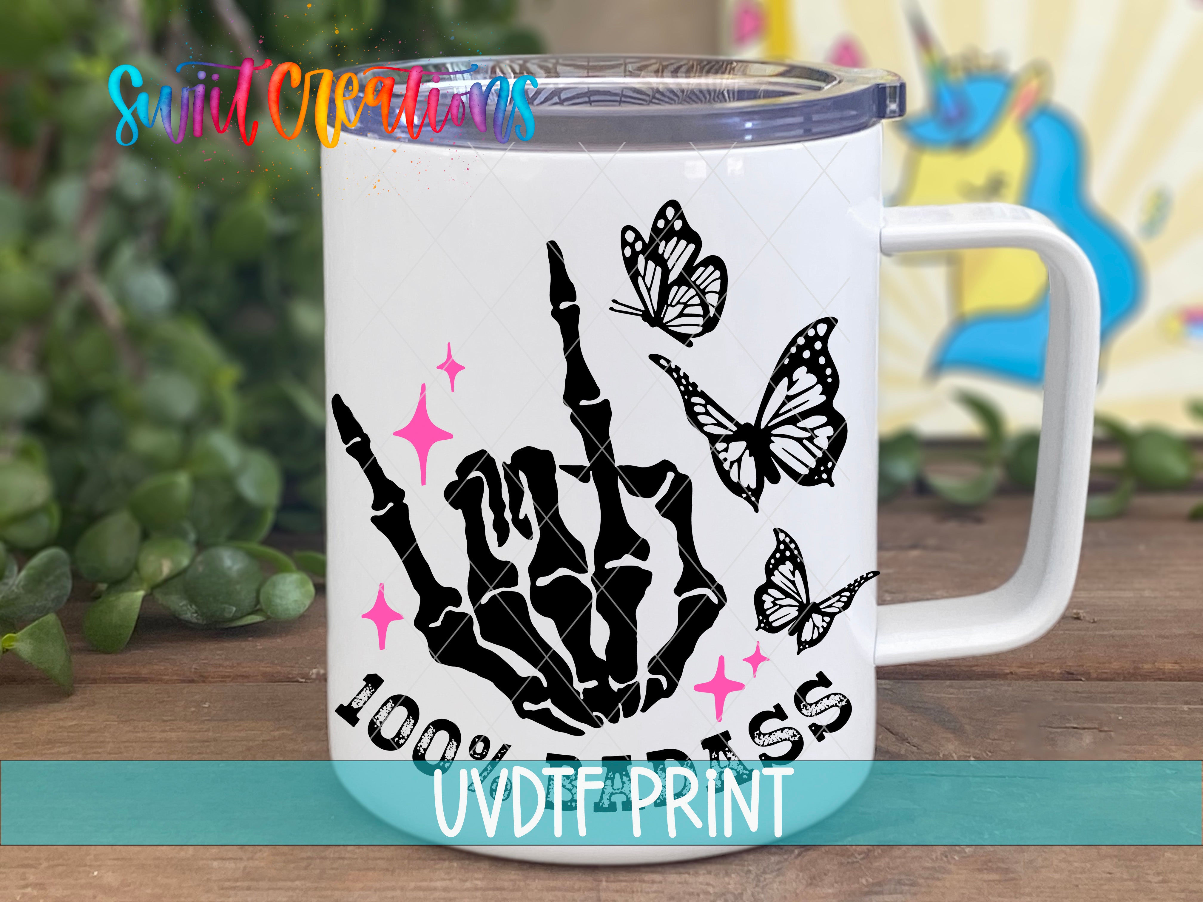 a white coffee mug with a black hand and butterflies on it