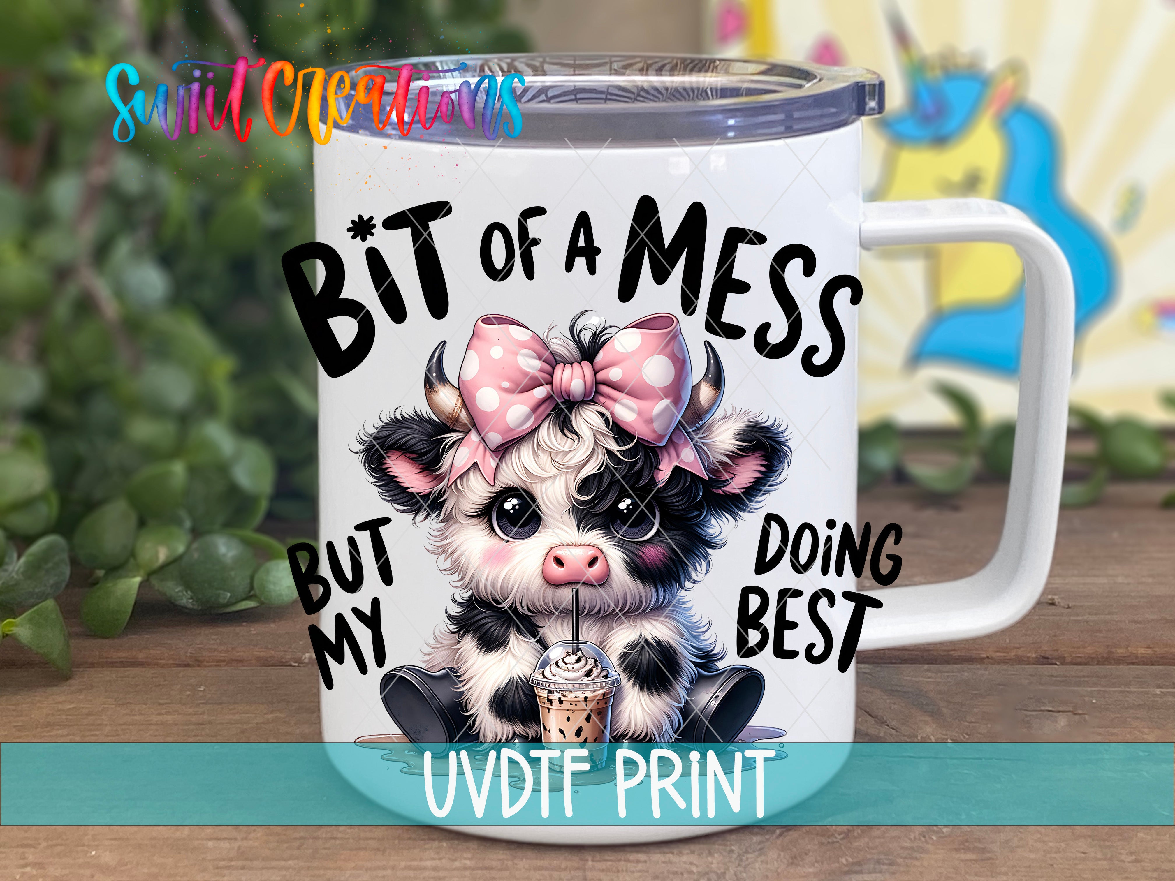 a coffee mug with a picture of a baby cow wearing a pink bow