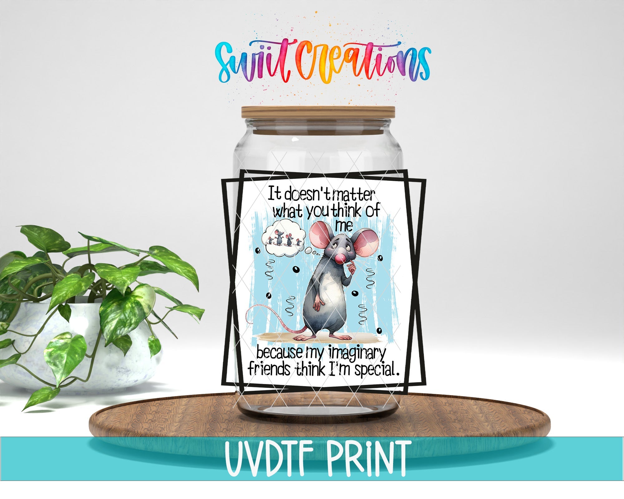 a glass jar with a picture of a mouse on it