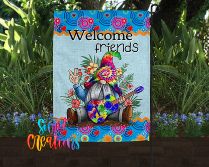 A colorful garden sign featuring a gnome holding a guitar and surrounded by flowers and plants.