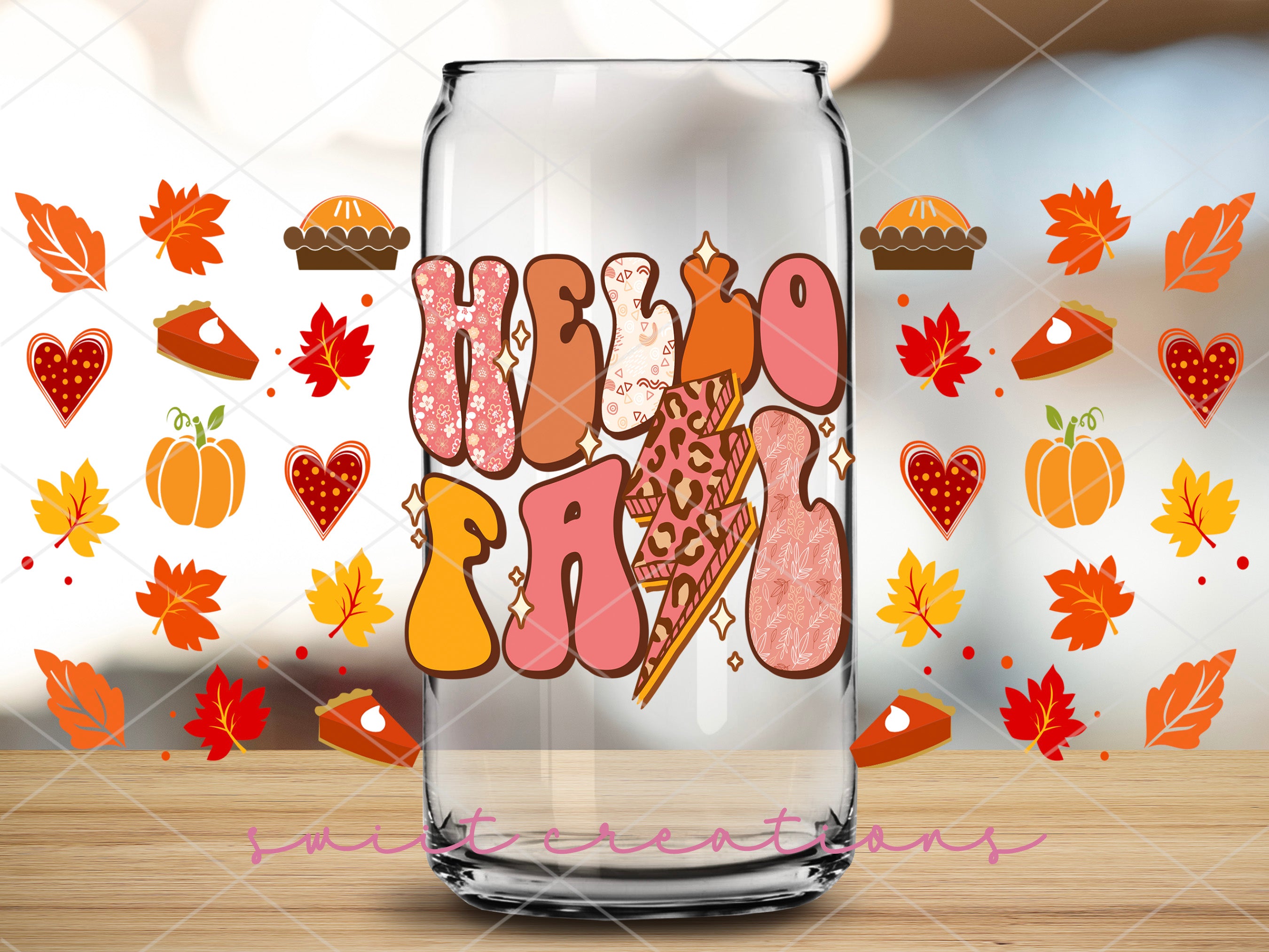 a glass with the words hello fall written in it