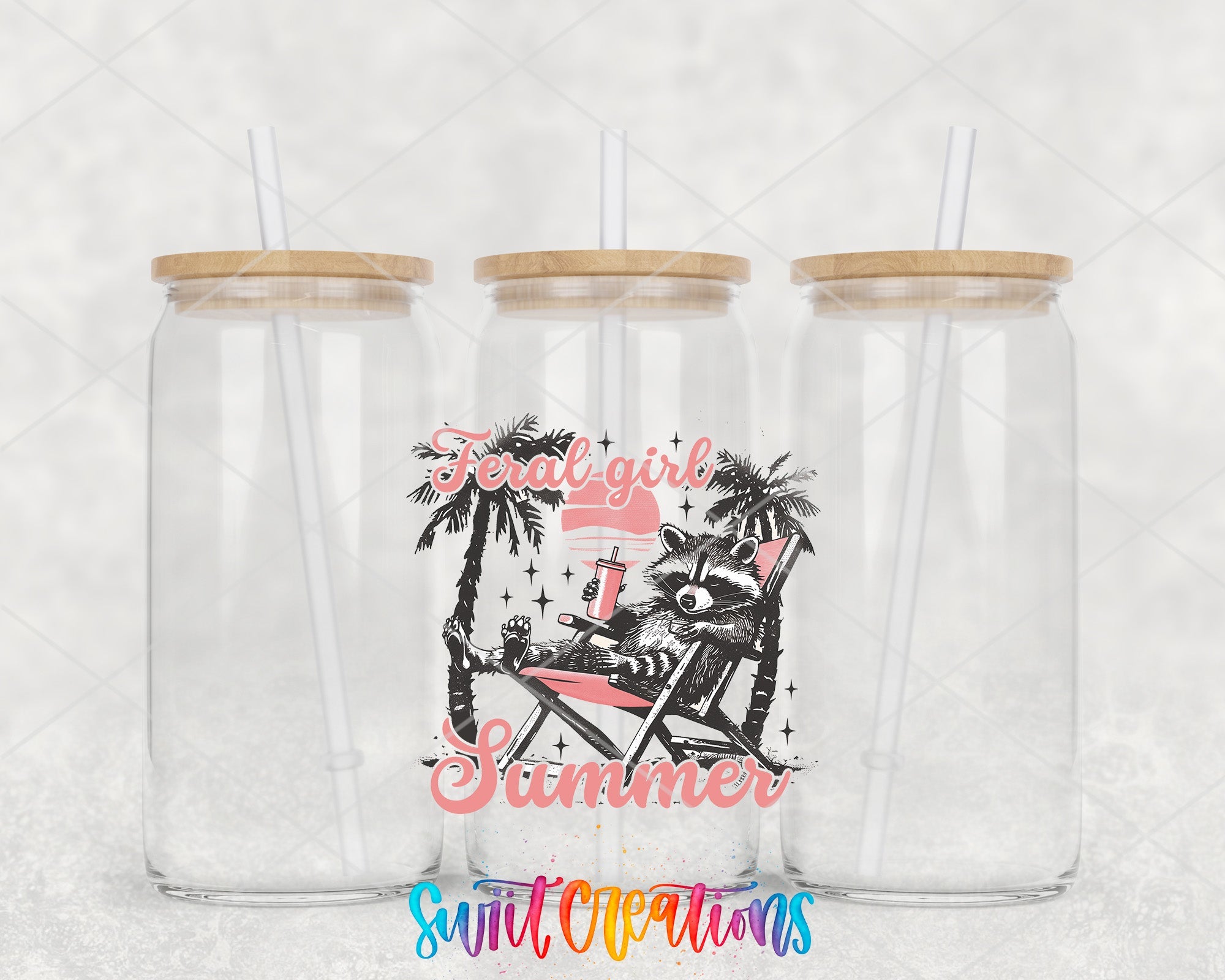 two clear tumblers with a beach scene on them