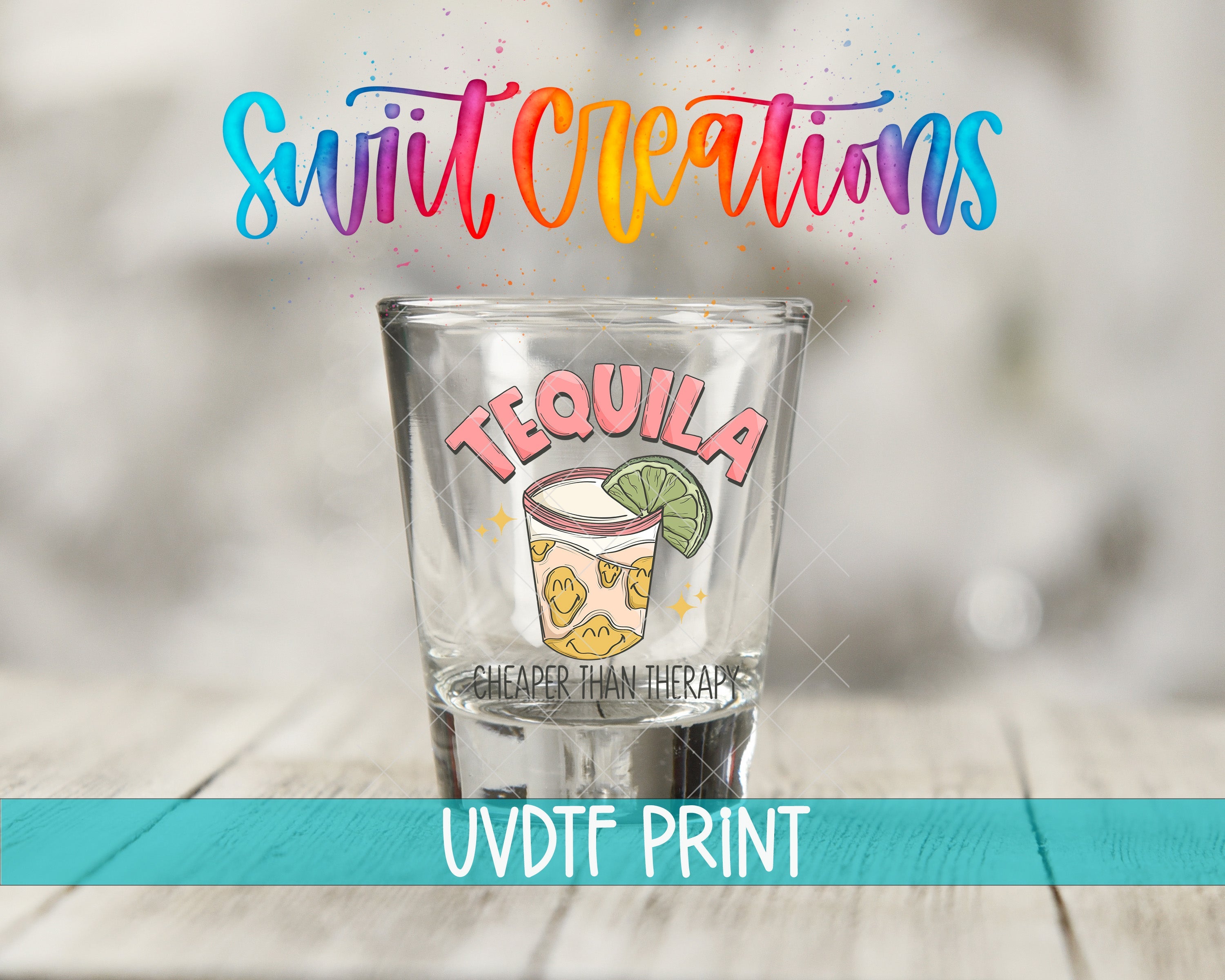 a shot glass sitting on top of a wooden table