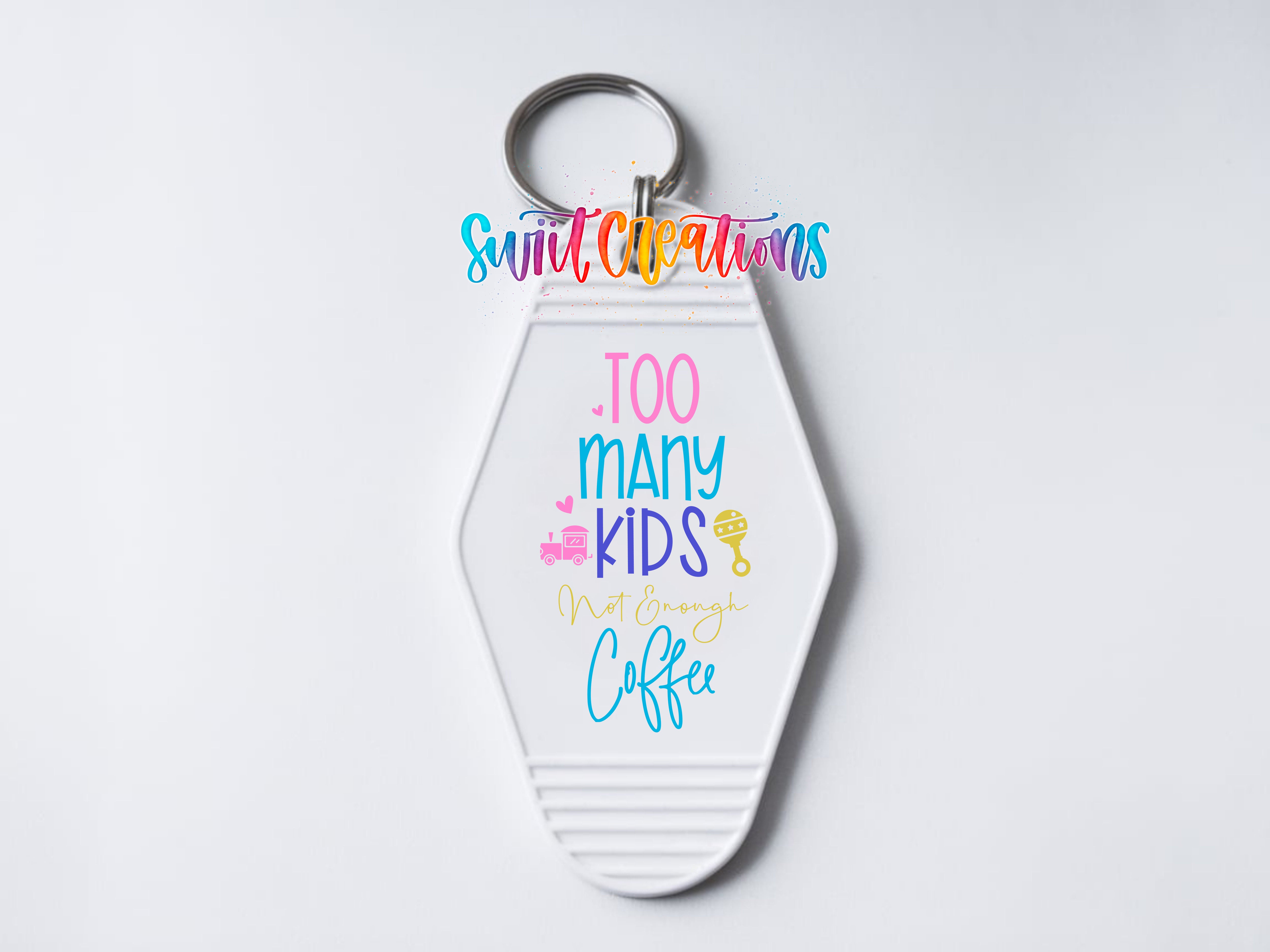 A keychain with a message that says "Too many kids, not enough coffee" in a colorful, playful font.