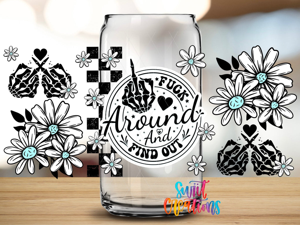 Close-up of the F*ck Around and Find Out floral skeleton hands UV DTF full wrap on a clear glass can