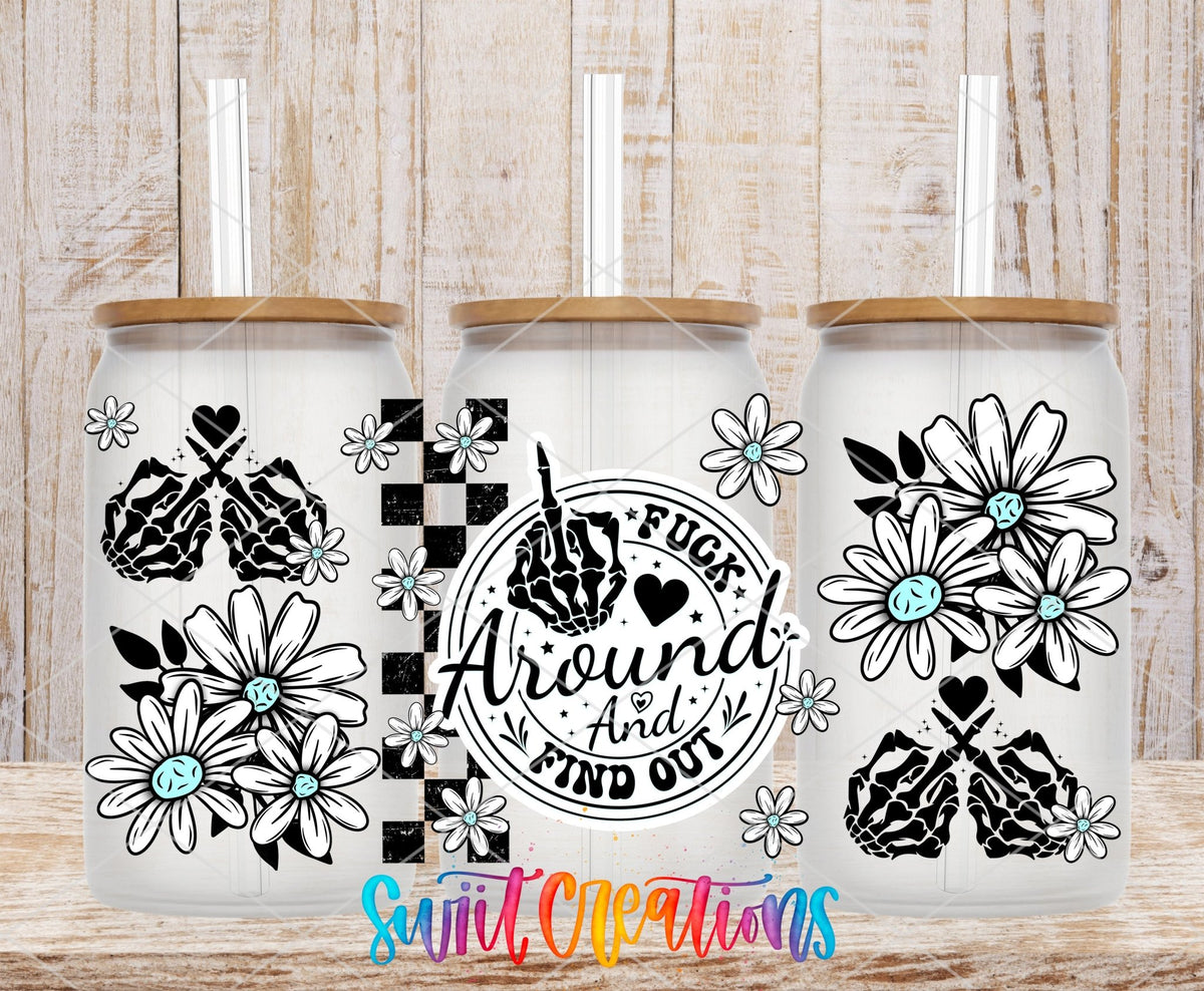 F*ck Around and Find Out floral skeleton hands UV DTF full wrap on three clear glass cans with bamboo lids