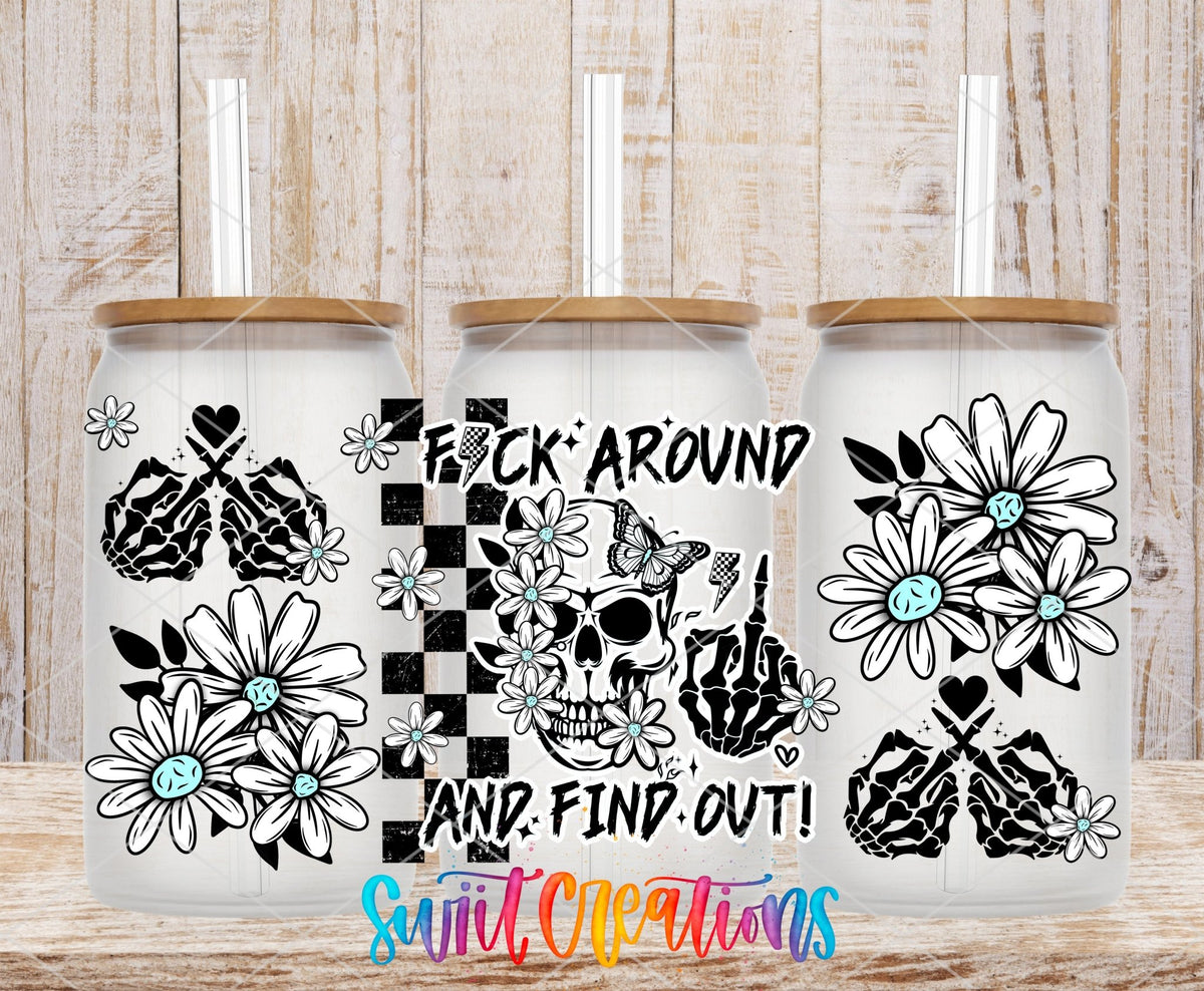 F*ck Around and Find Out skull and daisies UV DTF full wrap on three clear glass cans with bamboo lids