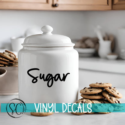 a cookie jar sitting on top of a counter next to cookies