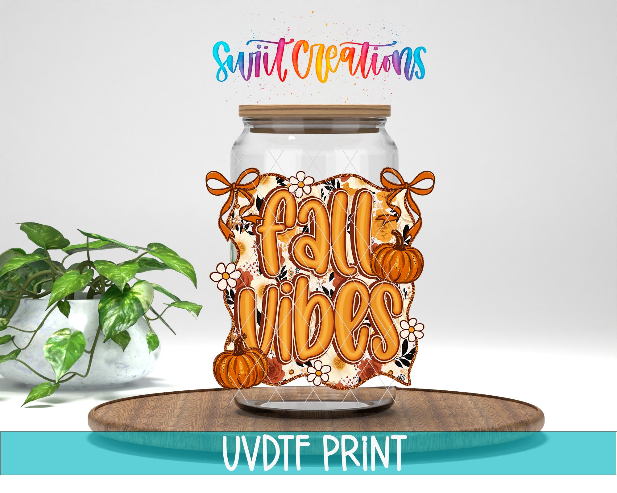 a glass jar with a label that says "Fall Vibes" and has a pumpkin and flowers on it. The jar is placed on a wooden surface, and there is a potted plant in the background.