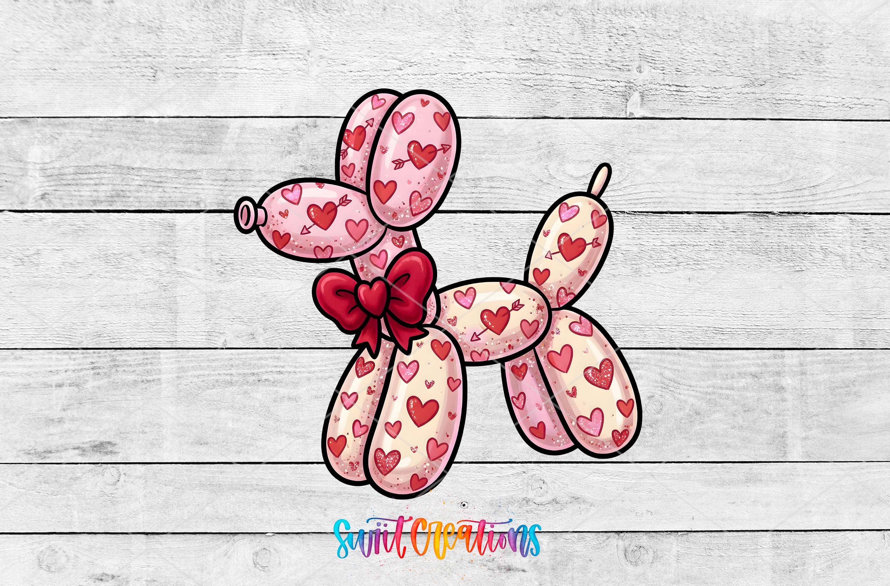 A balloon dog with a heart pattern on its body and a bow around its neck, sitting on a wooden background.