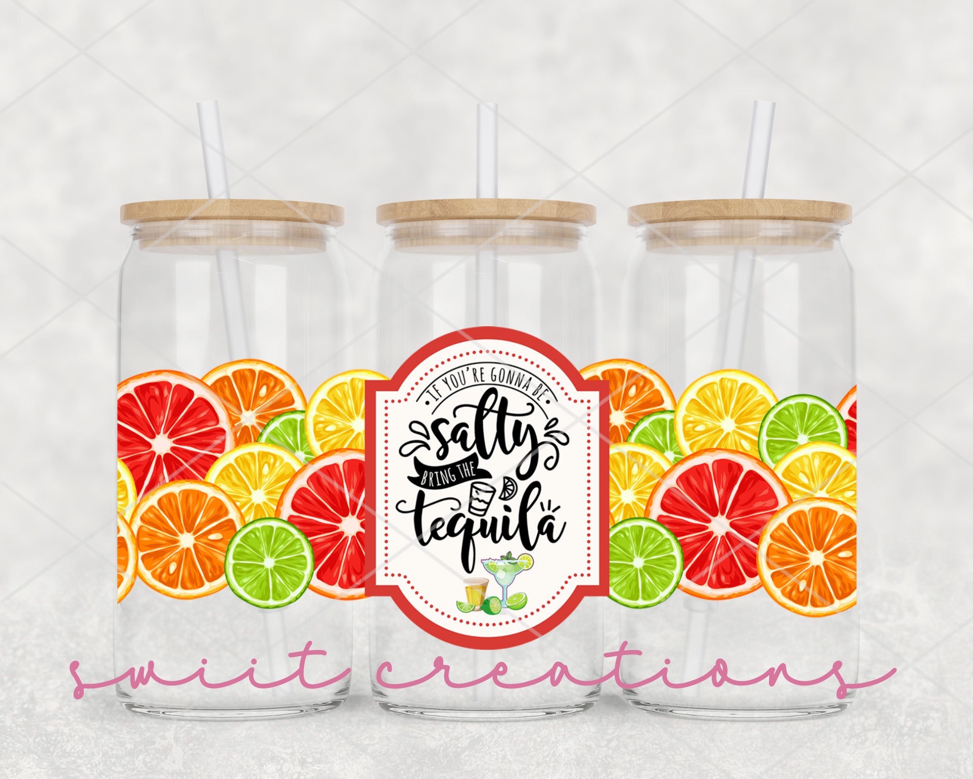 a couple of mason jars filled with oranges and limes