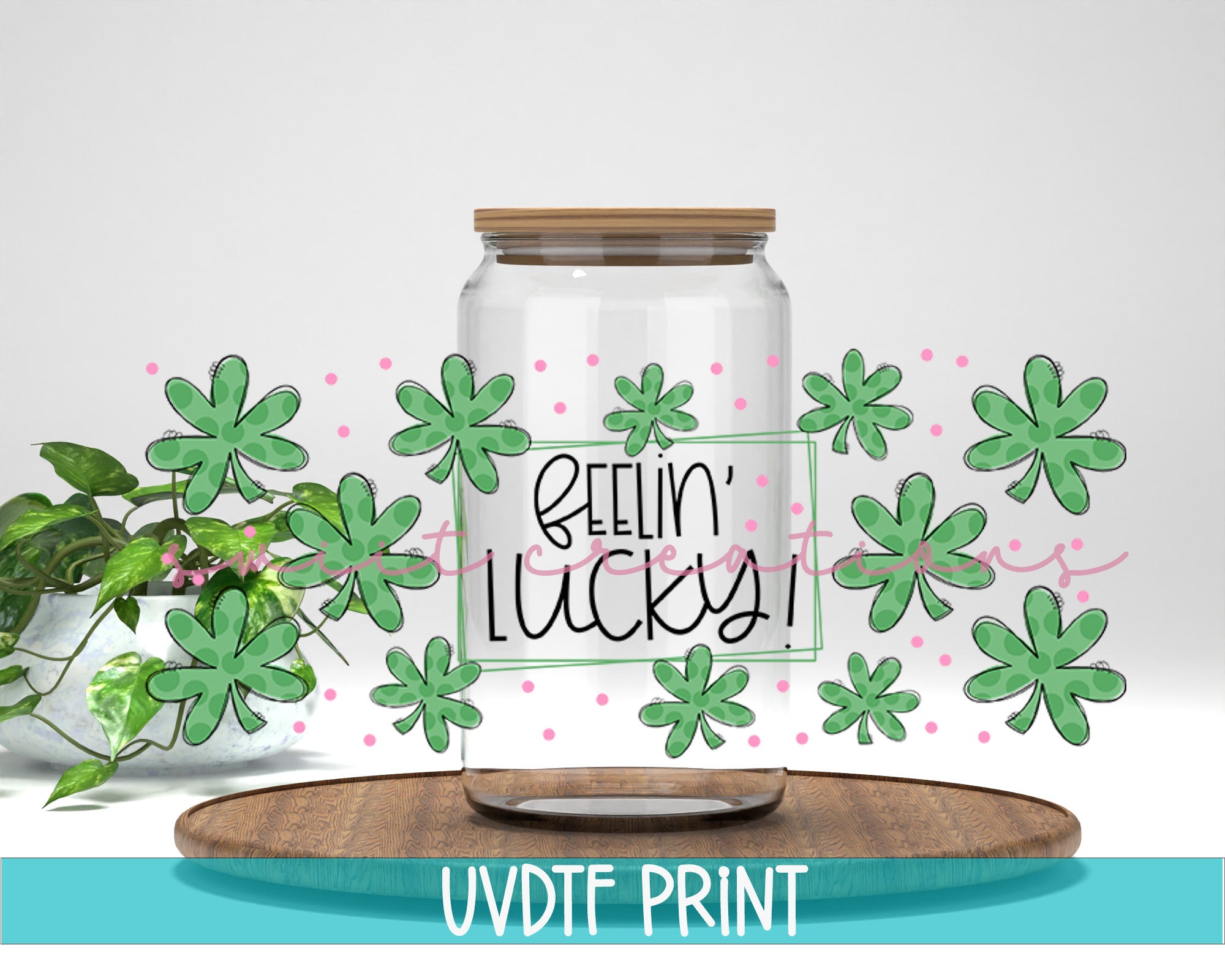 a glass jar with a plant inside of it