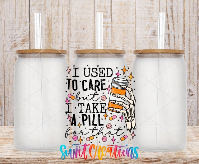 two coffee mugs with the words i used to care i take a pill and