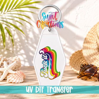 F*ck It motel keychain UV DTF transfer on a white keychain with palm leaves, shells, and a straw hat