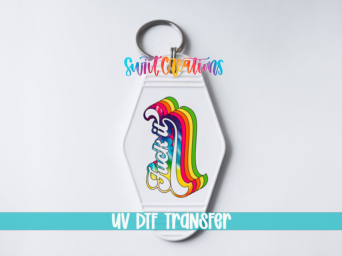 F*ck It UV DTF transfer on a white motel keychain on a white background