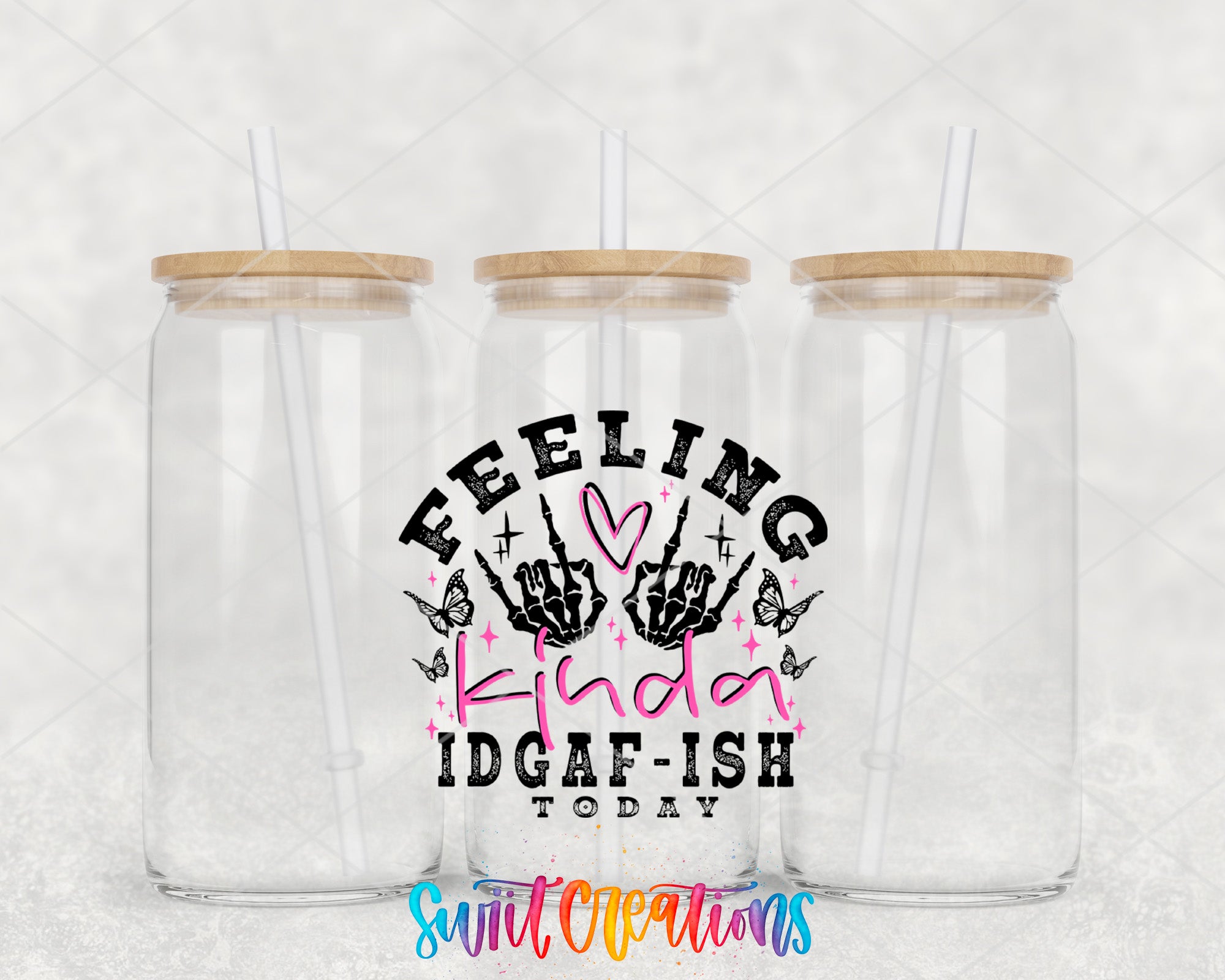 a couple of plastic cups with straws in them