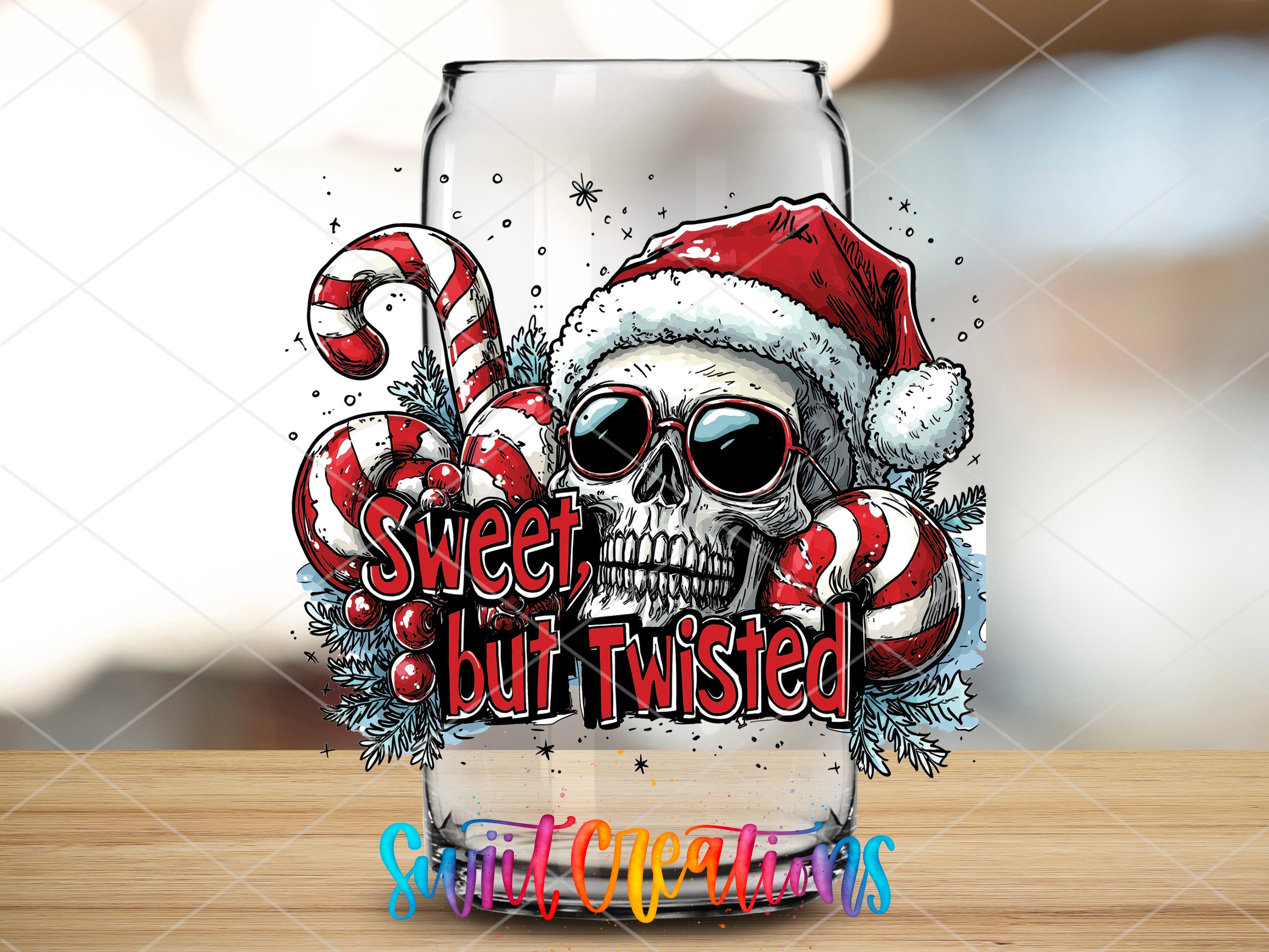 a glass with a skull wearing a santa hat and candy canes