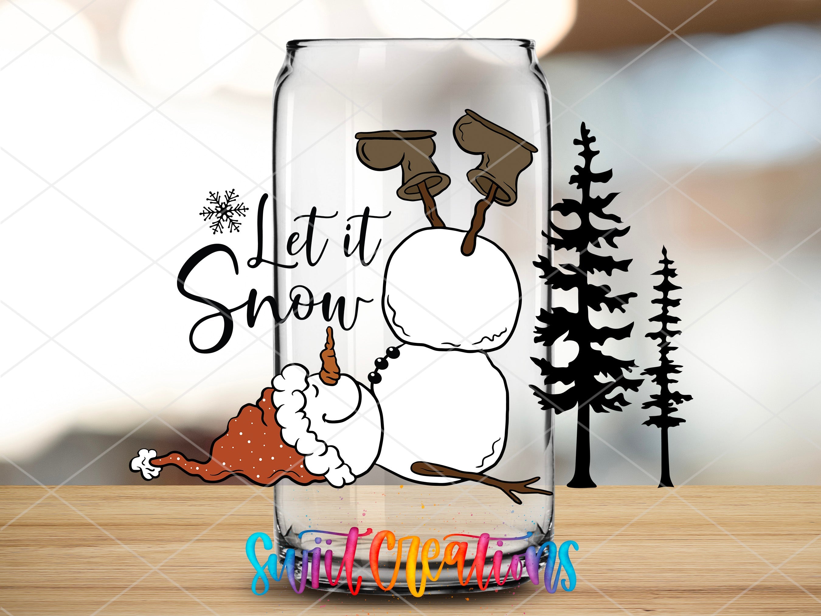 a glass with a picture of a snowman on it