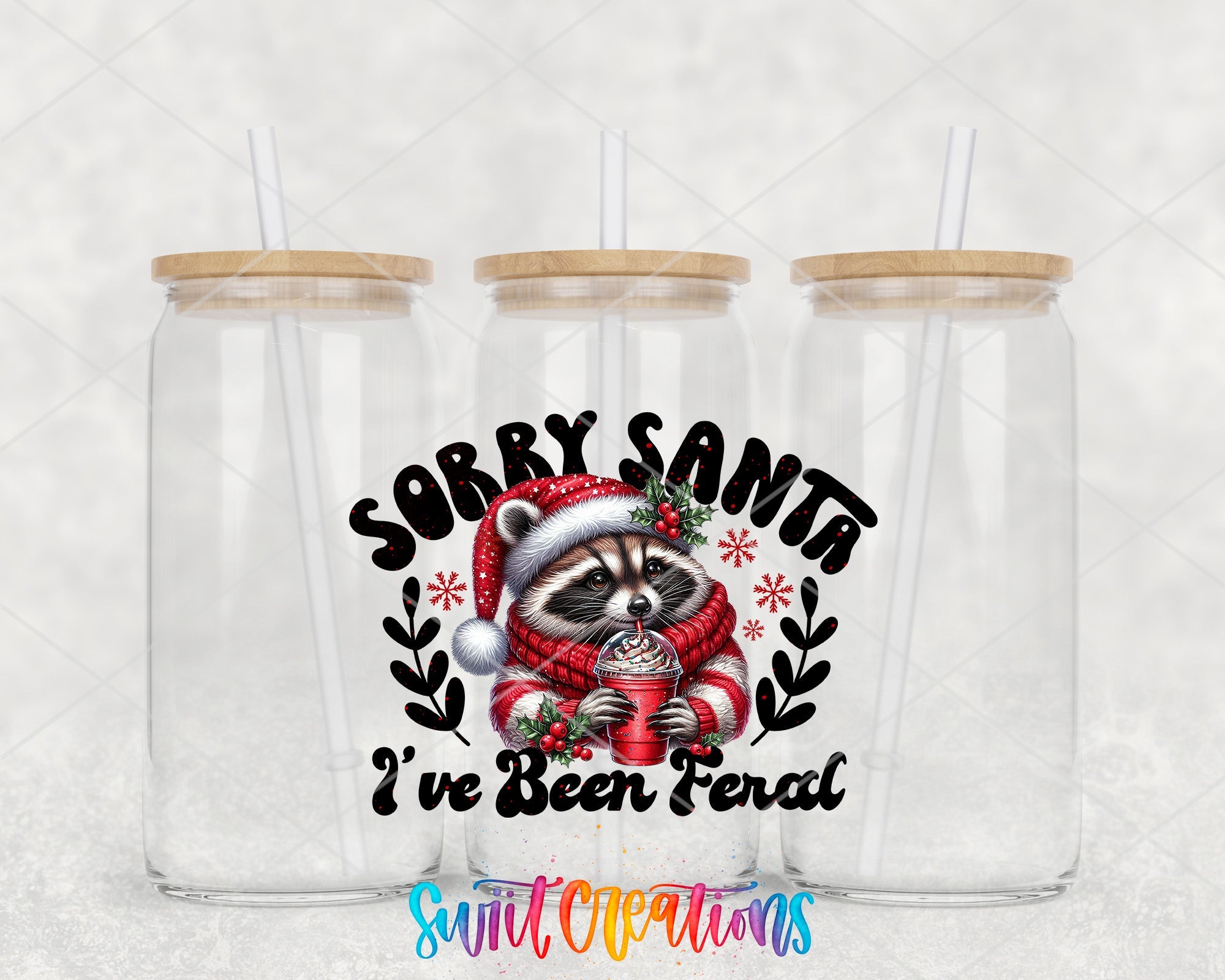 two clear tumblers with a raccoon wearing a santa hat and holding a