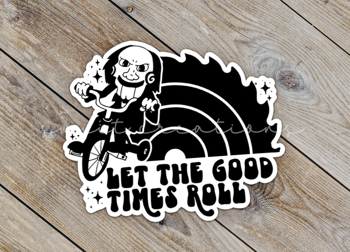 Close-up of the Let the Good Times Roll Horror sticker on rustic wood