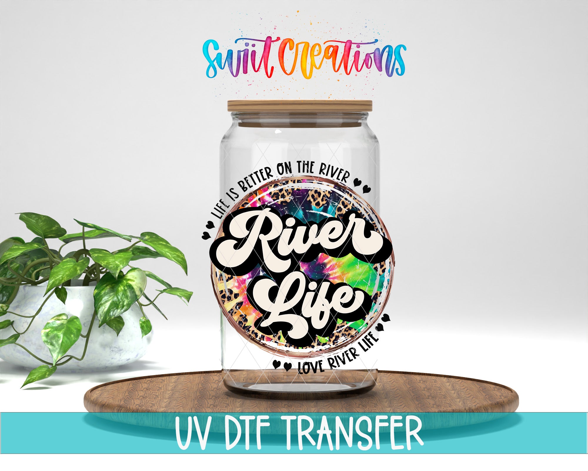 a glass jar with a colorful, tie-dye design on it, placed on a wooden surface. The jar has a lid and is surrounded by a potted plant. The text on the jar reads "River Life" and "Love River Life", and there is a rainbow-colored logo above the jar. The image also includes the text "UV DFT TRANSFER" at the bottom.
