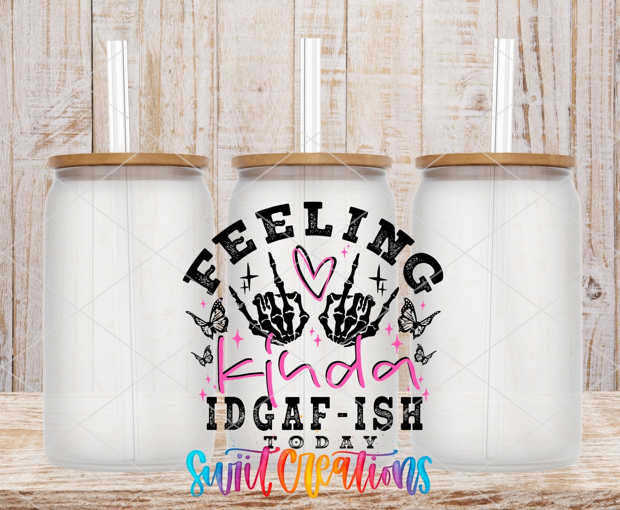 Feeling Kinda IDGAF-ish Today UV DTF transfer applied to a clear glass can set from Swiit Creations