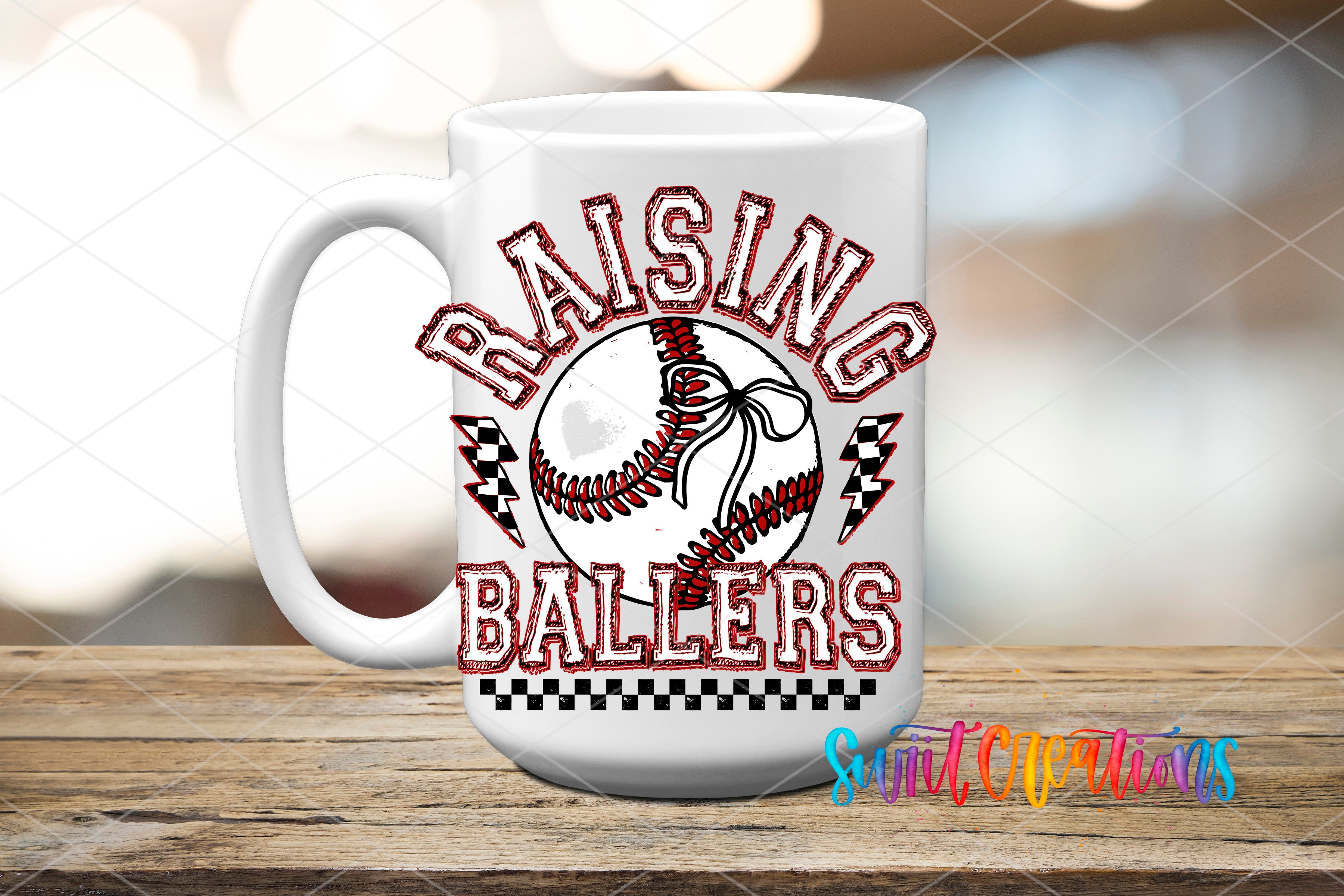 A white mug with the text "RAISING BALLERS" printed on it, featuring a baseball graphic and checkered flags.