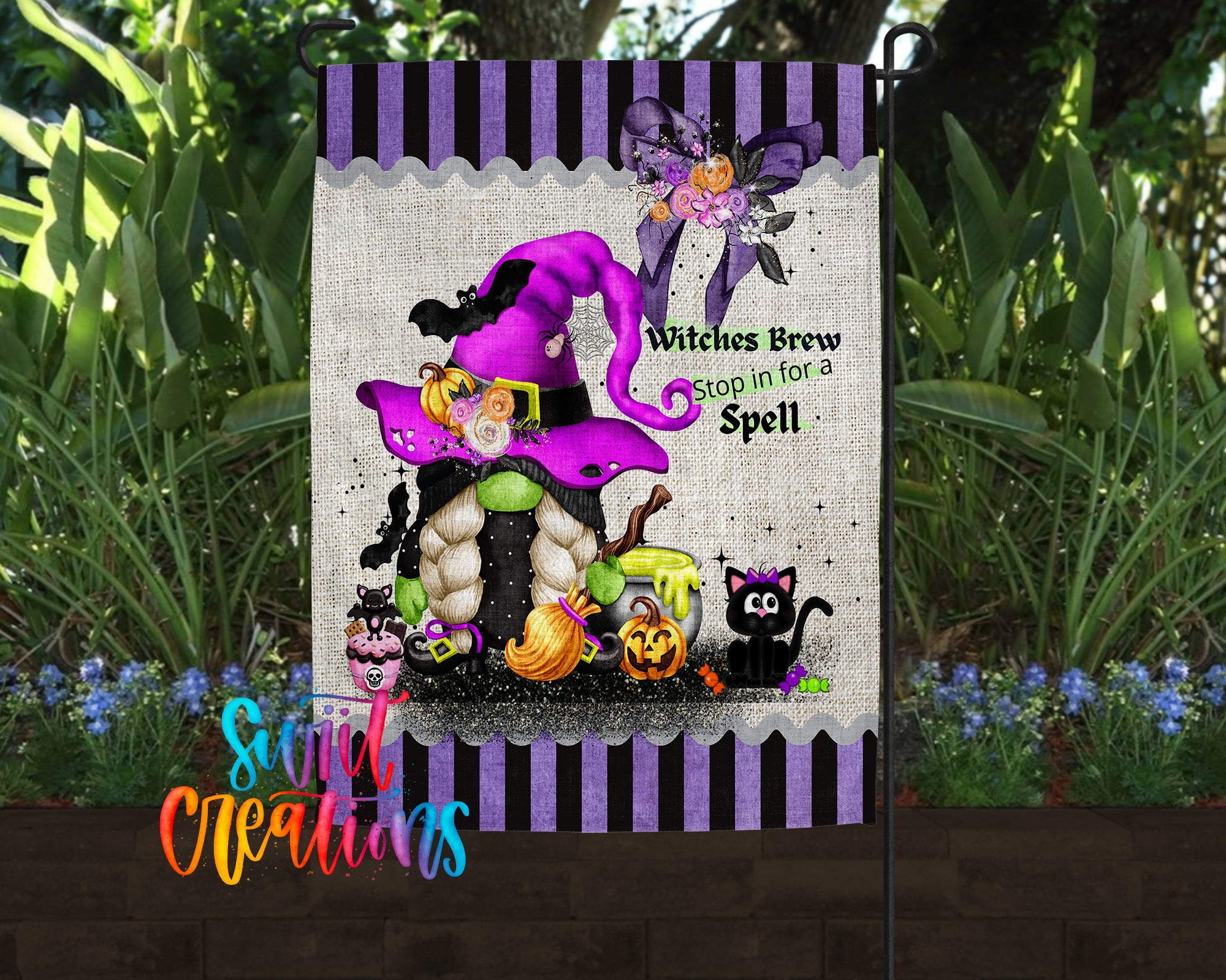 A Halloween-themed garden flag featuring a purple witch's hat, a gnome, and various Halloween-related items such as pumpkins, bats, and a cat.