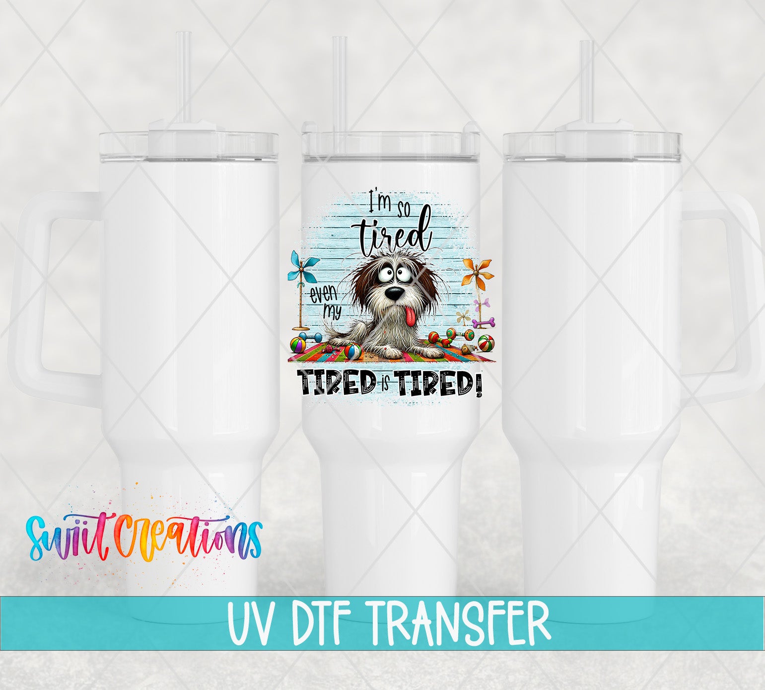 a white tumbler with a printed design on it, including a cartoon dog and text that says "I'm so tired even though I'm tired".