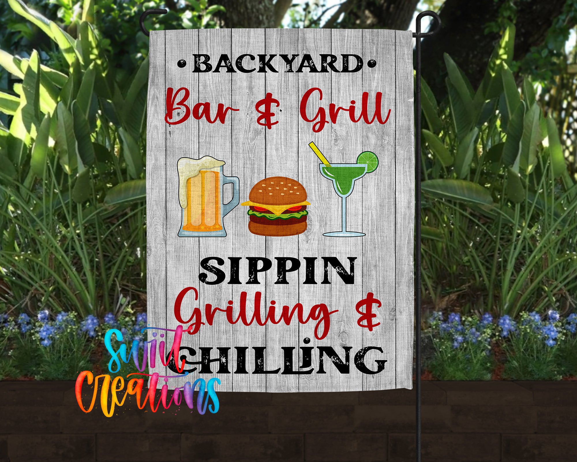 A wooden sign with the text "Backyard Bar & Grill Sippin' Grilling & Chilling" displayed prominently, along with illustrations of a hamburger, a beer mug, and a cocktail glass.