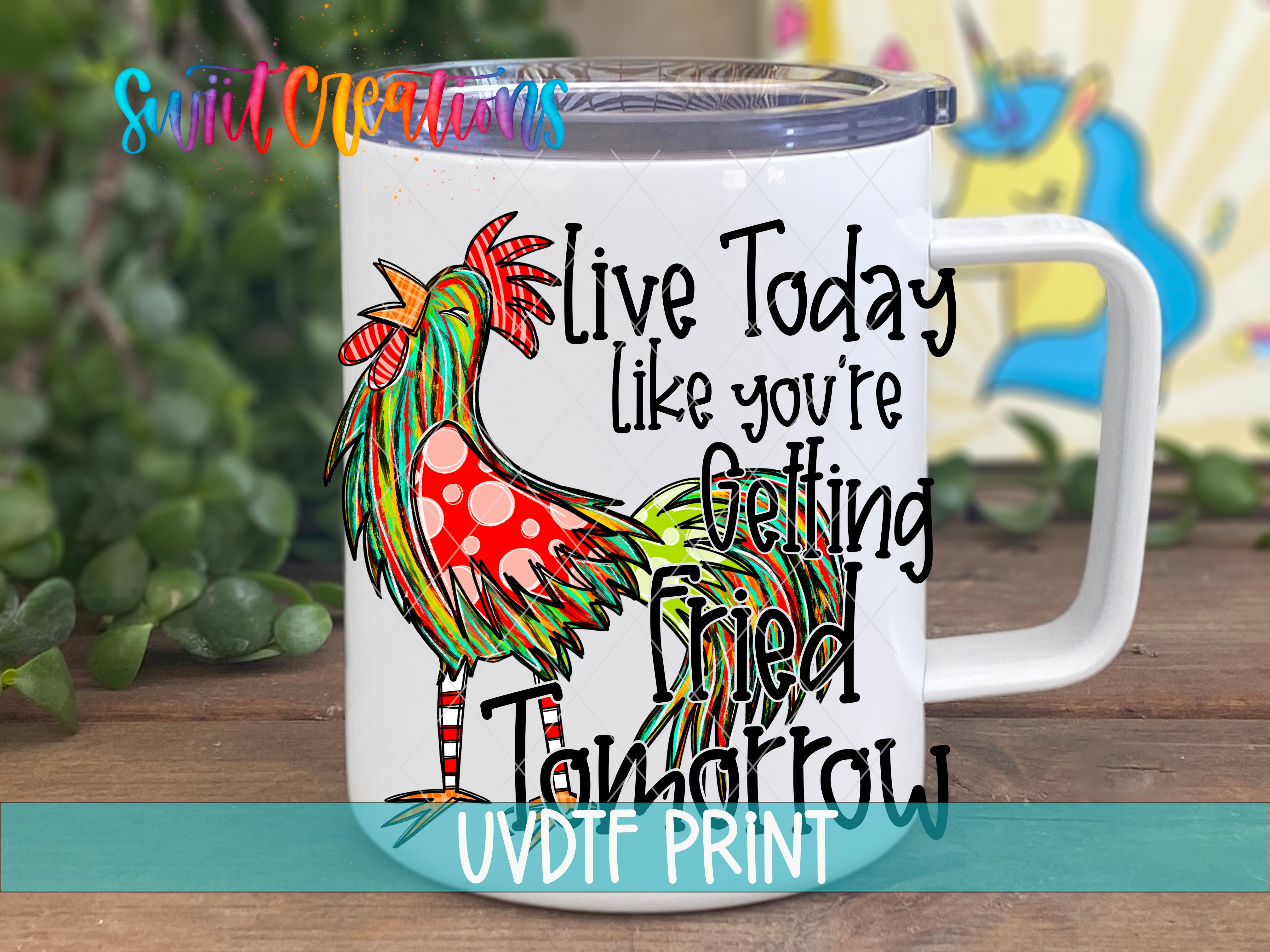 a white coffee mug with a colorful rooster on it