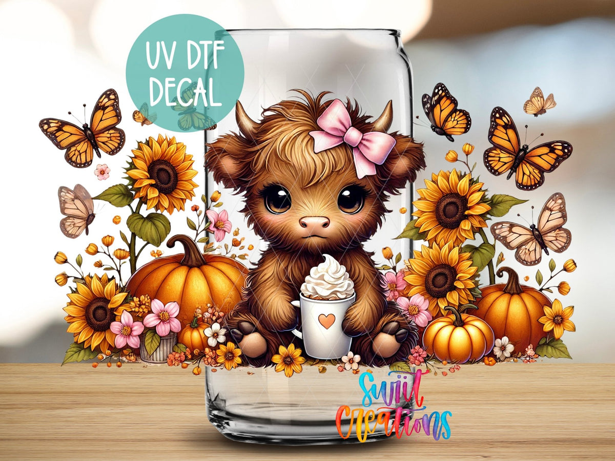 Close-up of the Fall Highland Cow UV DTF wrap on a clear glass can