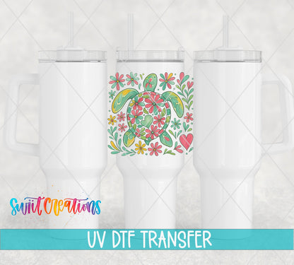 Floral Sea Turtle UV DTF transfer on white 40 oz tumblers