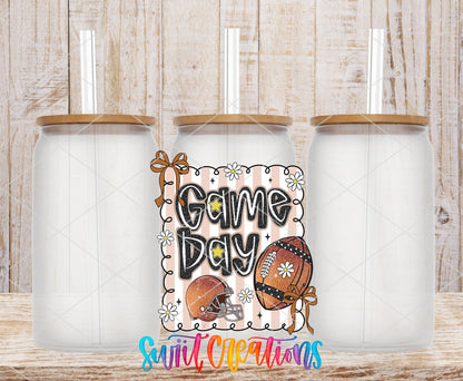 Game Day football and bows UV DTF transfer on frosted glass cans with bamboo lids