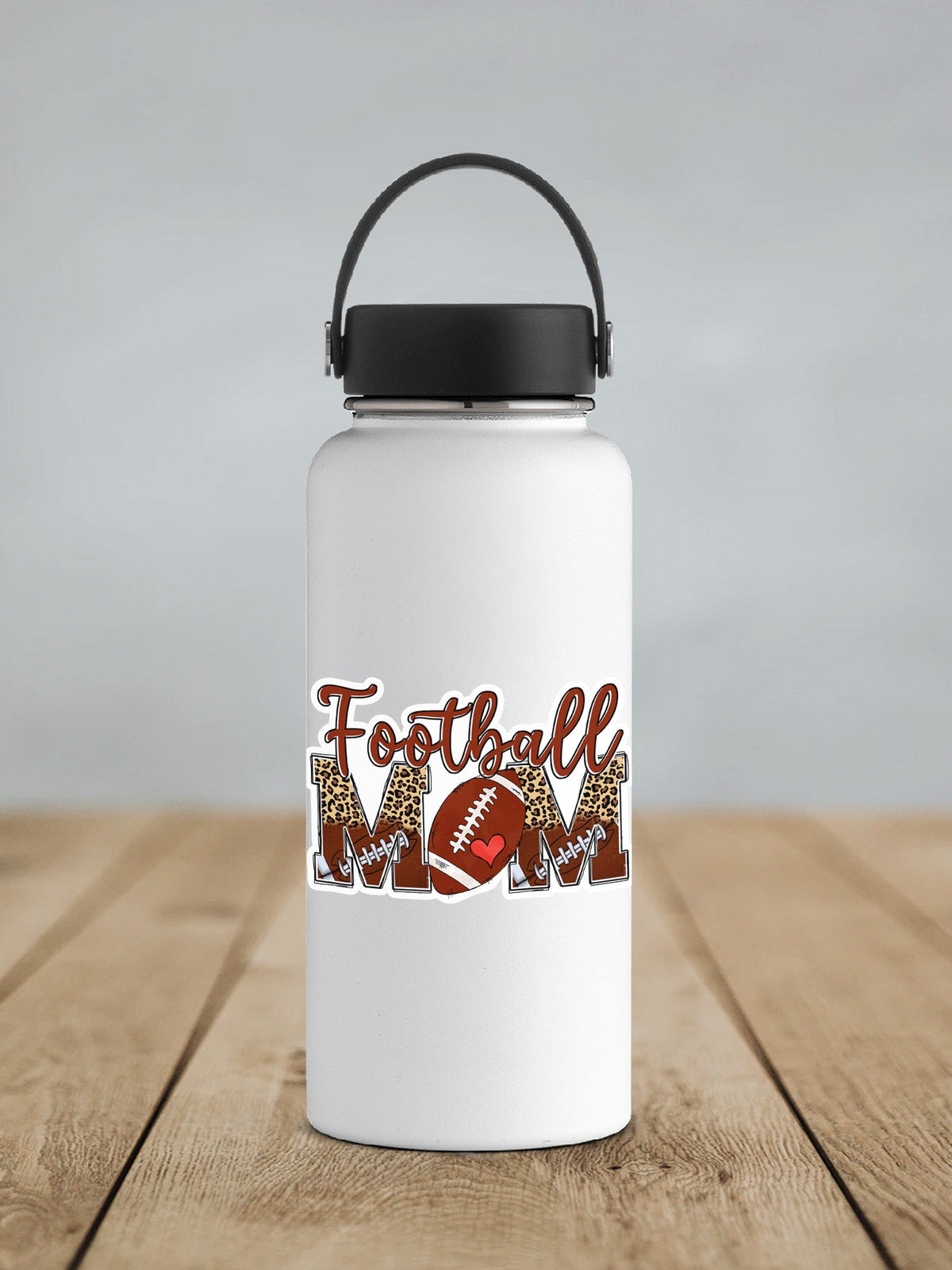 Football Mom sticker on a white insulated water bottle